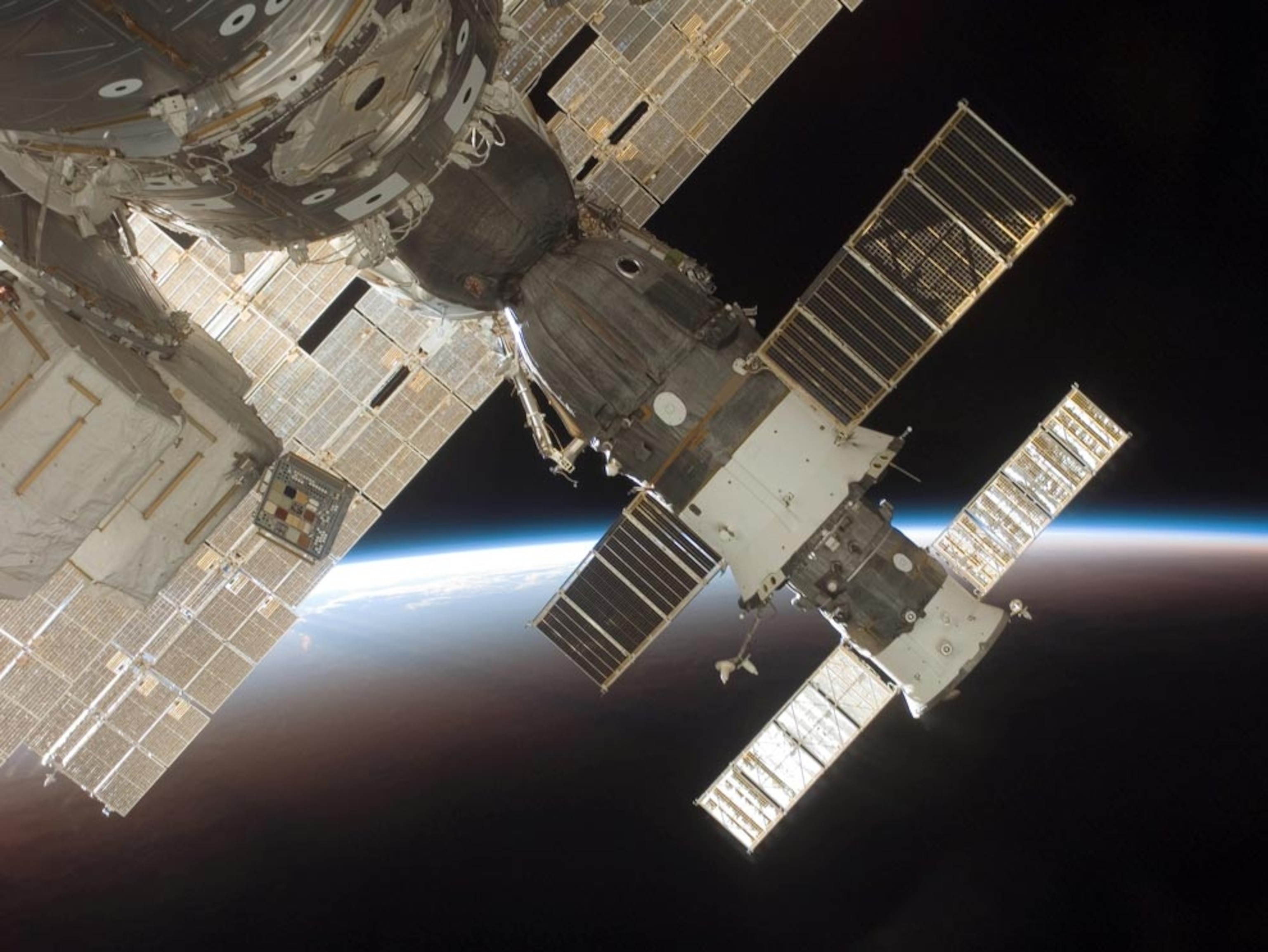 space shuttle Discovery with Progress 22 resupply vehicle