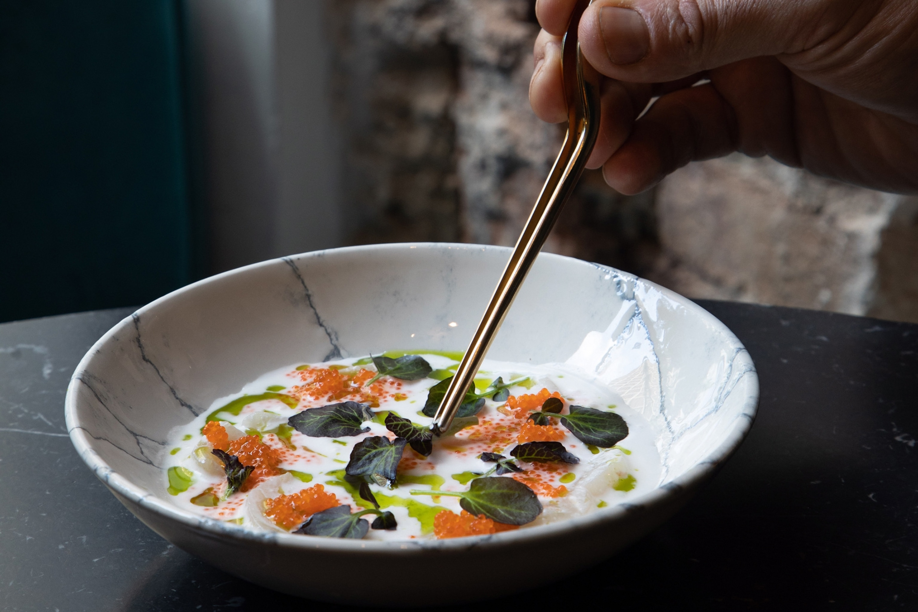 A bowl of scallop ceviche with coconut, lime and tobiko at Boro Bar.