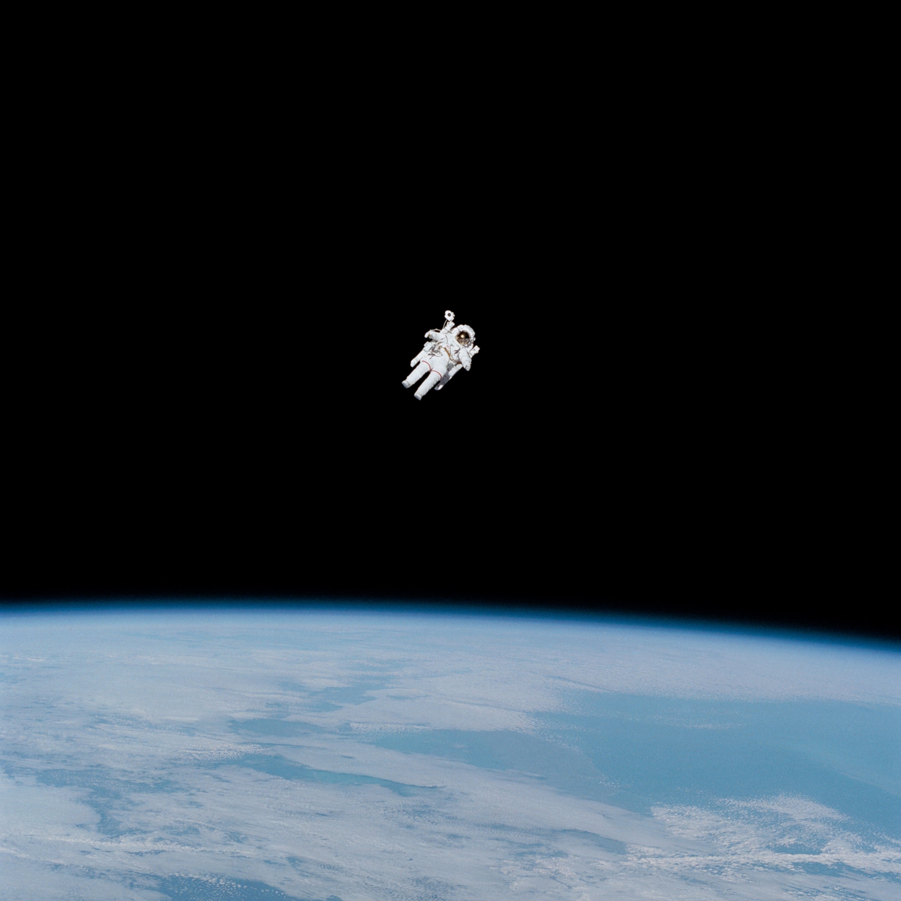 Astronaut free flying in space.