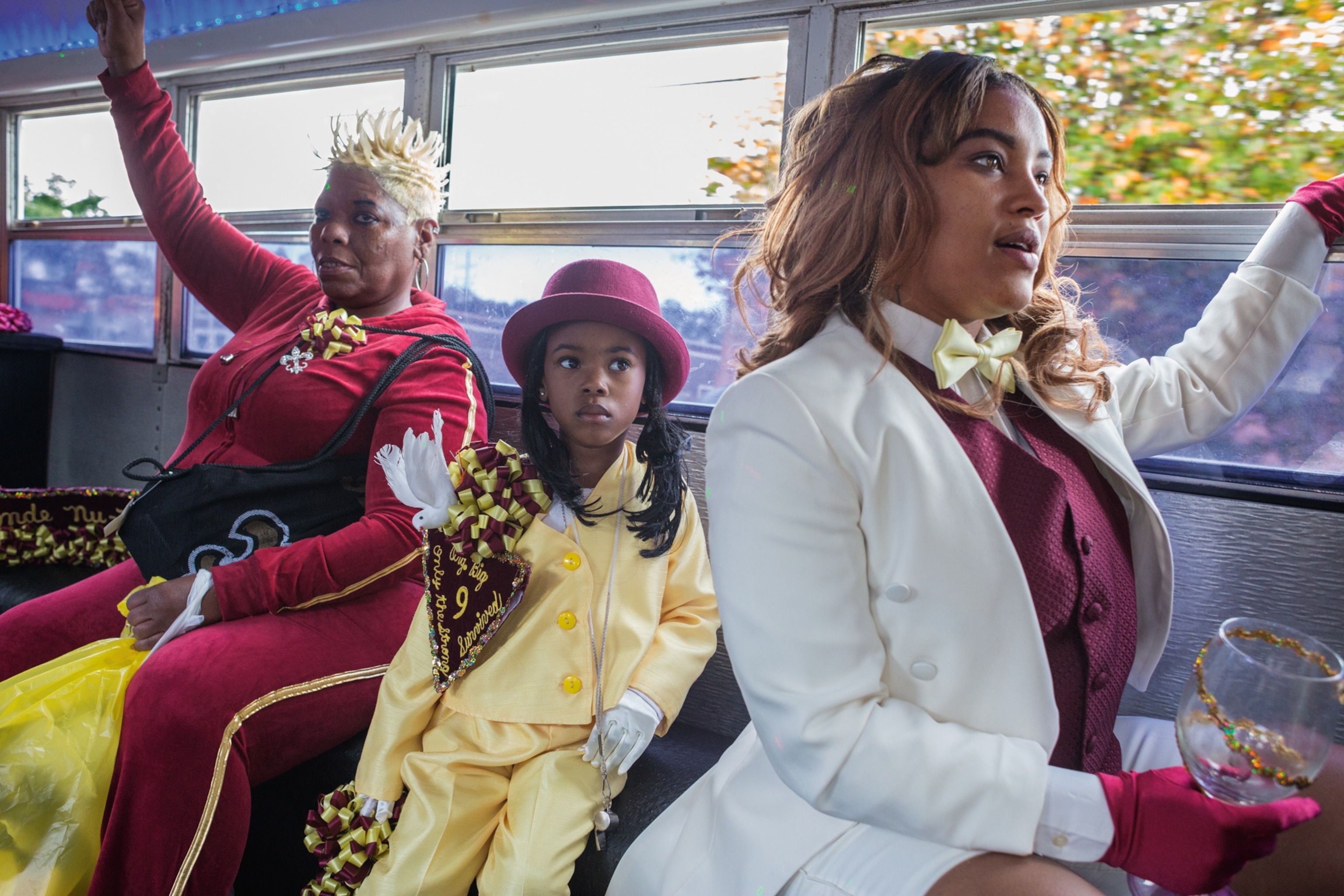 participants busing to the Big Nine Social Aid and Pleasure Club second-line parade