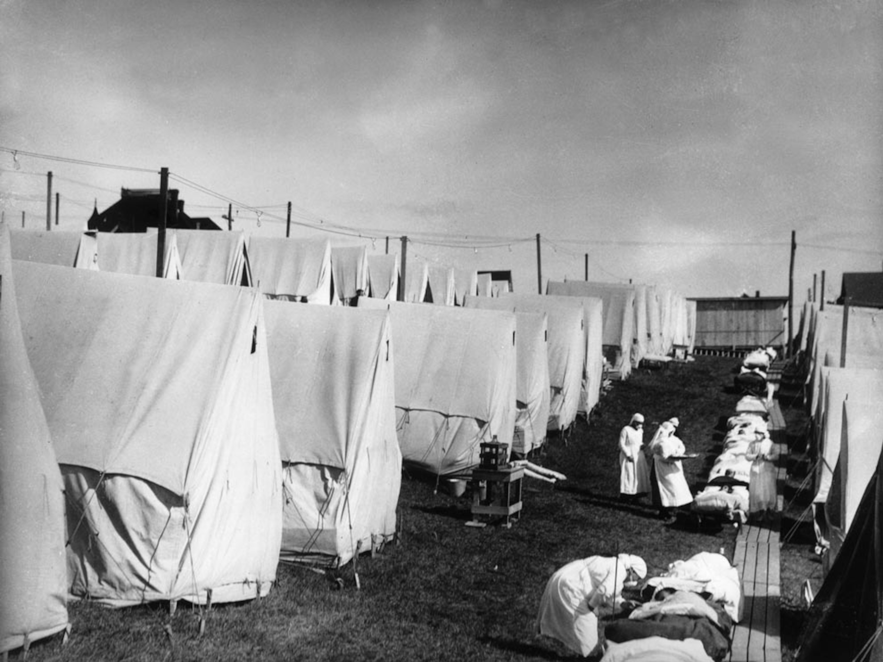 Nurses and flu patients in tents