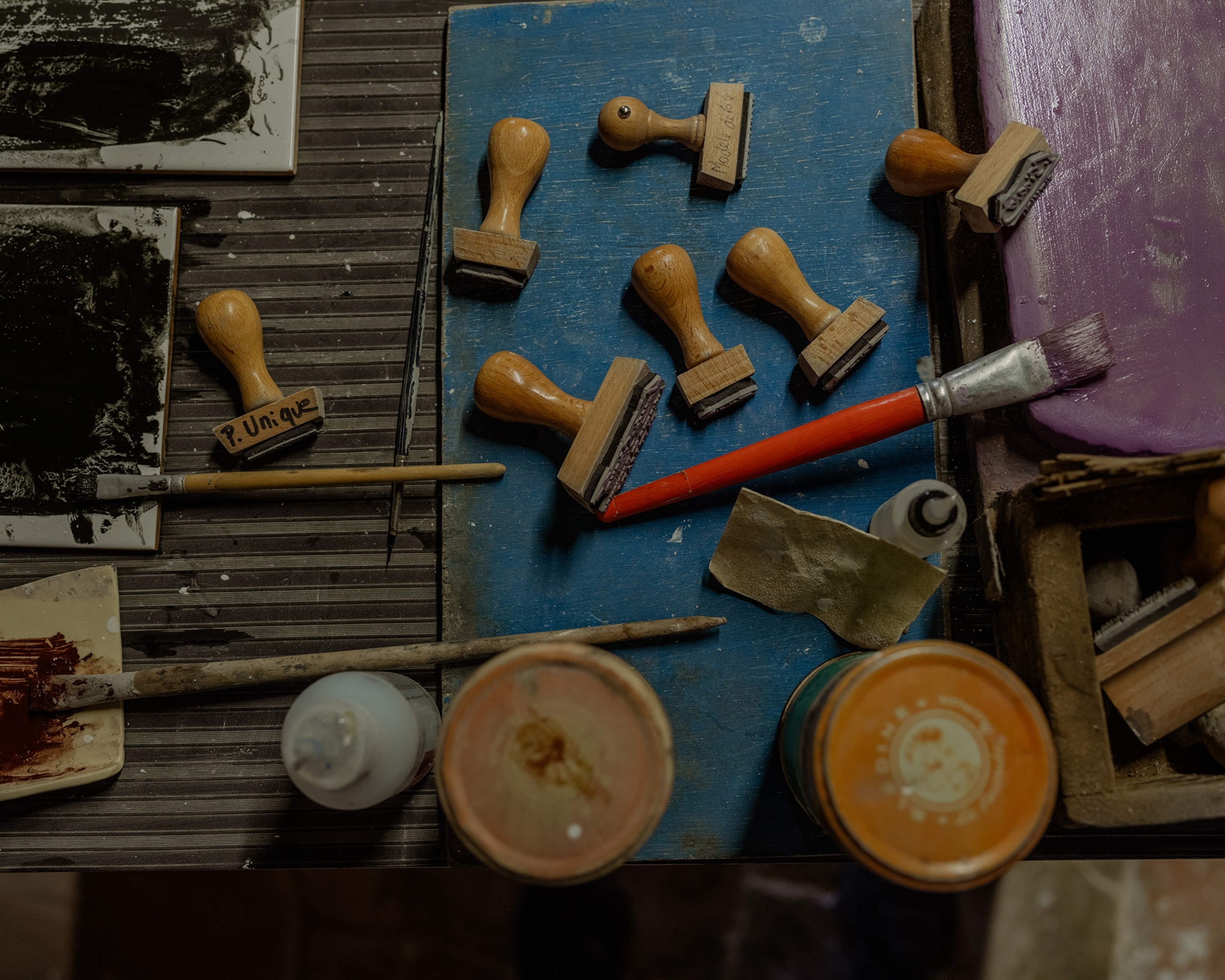 Louis Sicard Faïences stamps and ink rest on a work table.