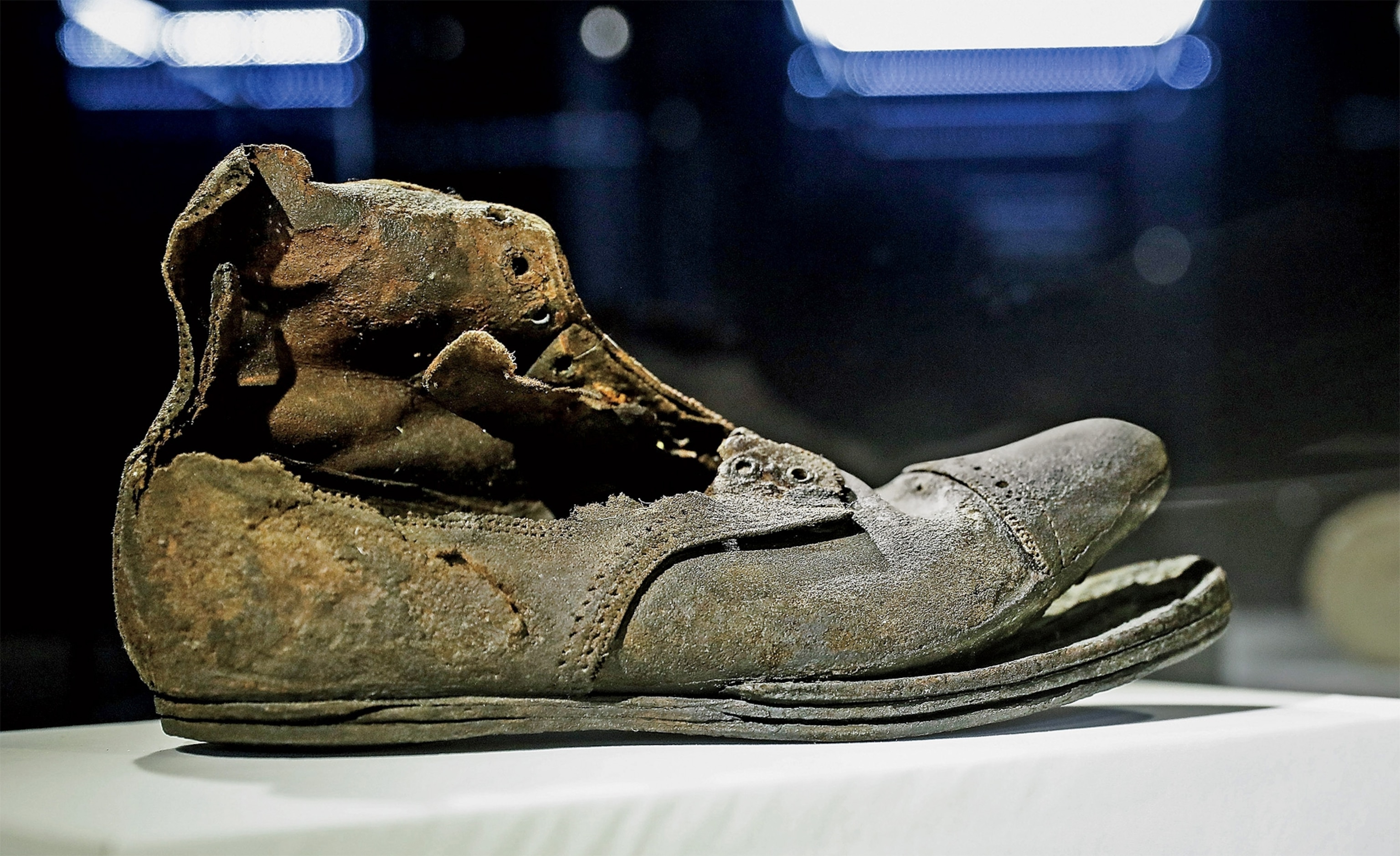 A lone shoe recovered from the wreck site is a stark reminder of the more than 1,500 lives lost.