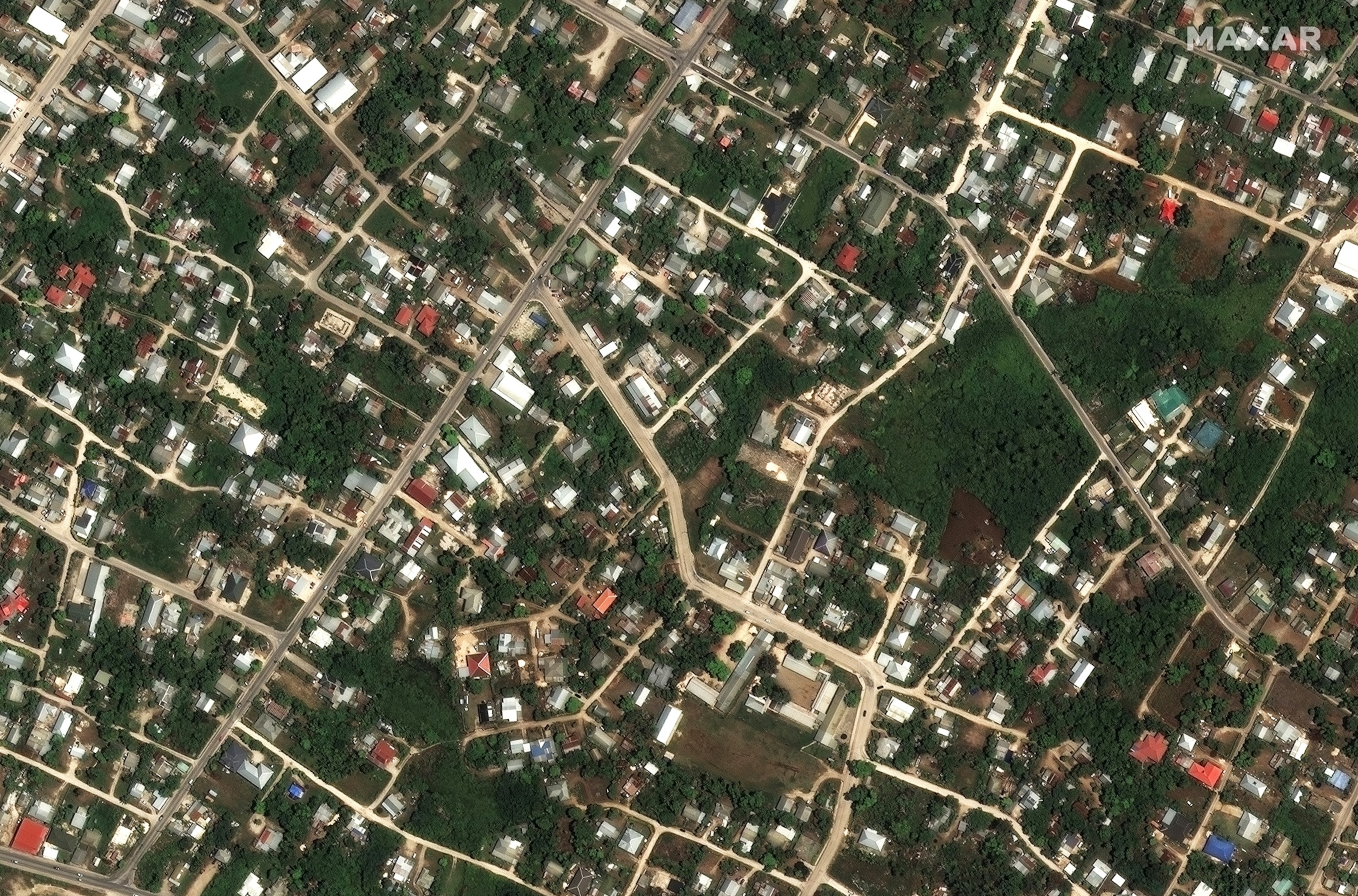 A Maxar satellite image shows the homes and buildings on December 29, 2021, before the Hunga Tonga-Hunga Ha'apai volcano eruption on January 14th , 2022 in Tongatapu, Tonga.
