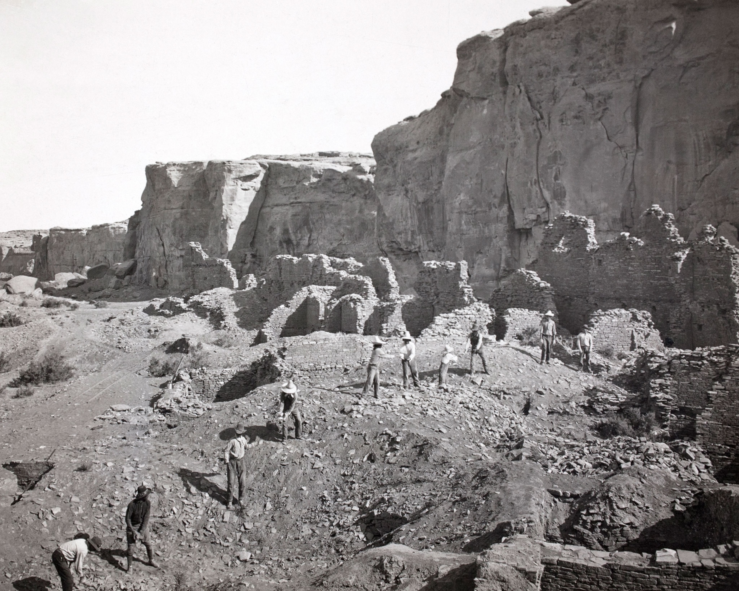 Archeologists remove unstable stones before excavating Pueblo Bonito.