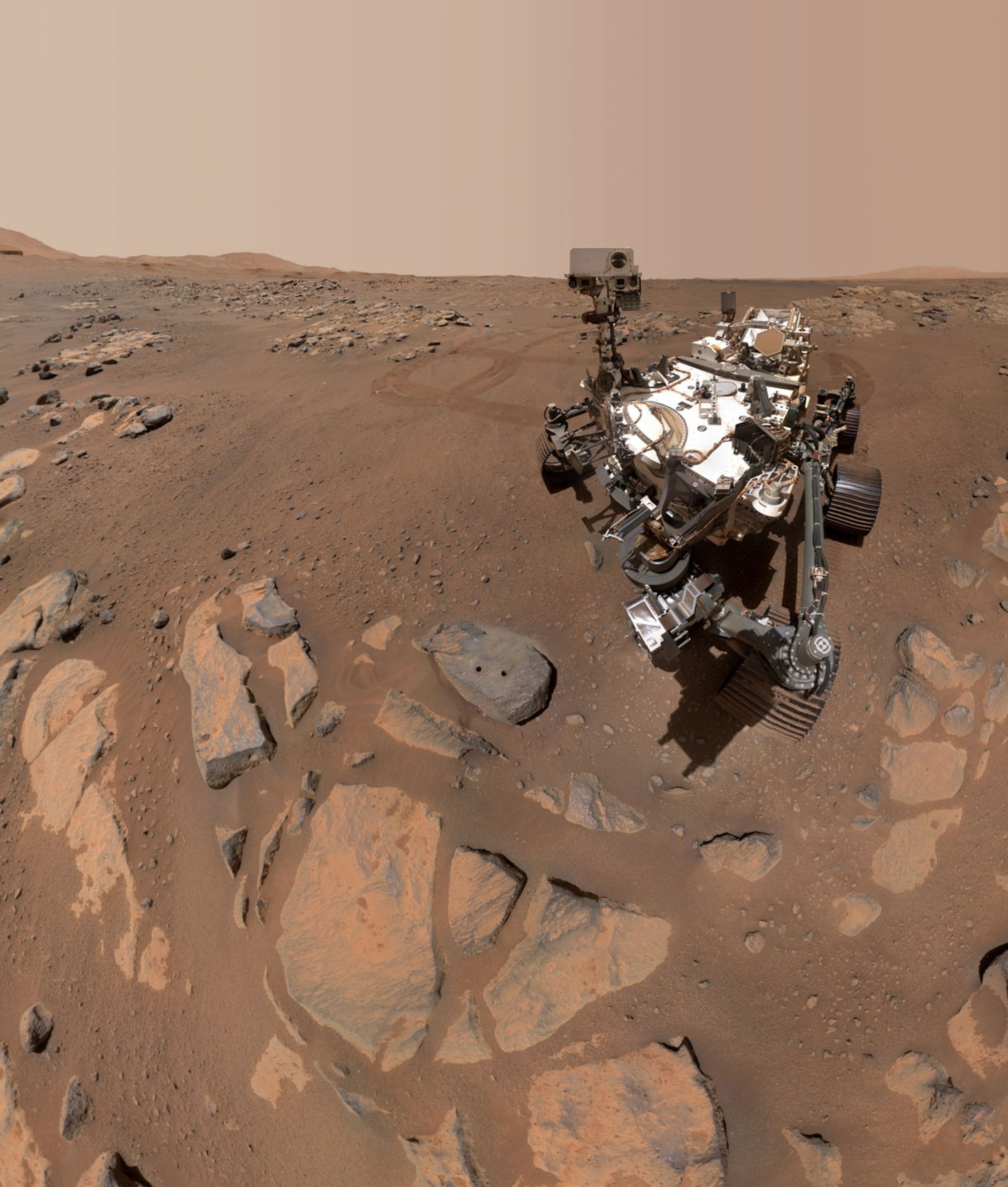 NASA’s Perseverance Mars rover took this selfie over a rock nicknamed “Rochette,” on September 10, 2021, the 198th Martian day, or sol of the mission. Two holes can be seen where the rover used its robotic arm to drill rock core samples.