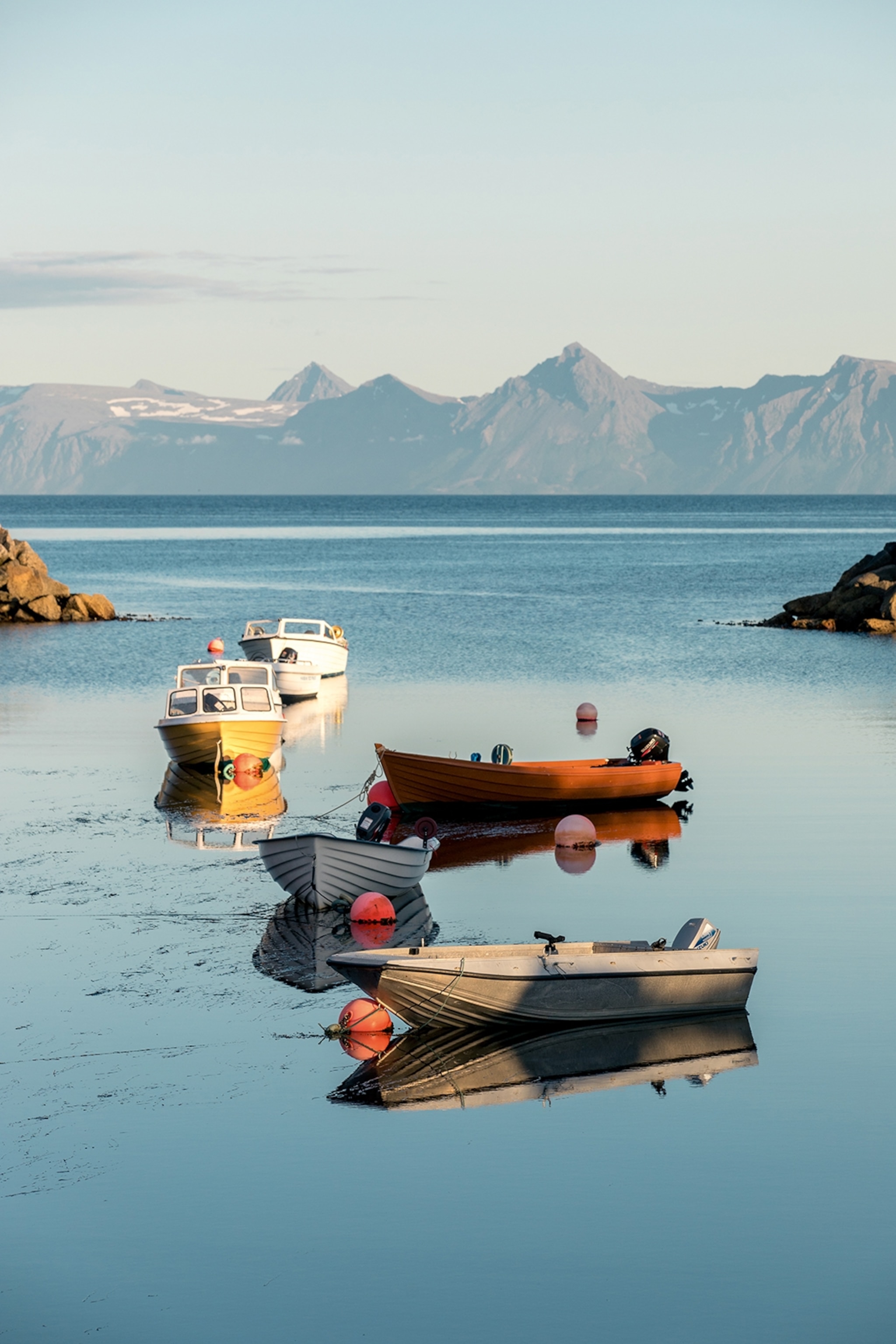 small fishing boats on the water