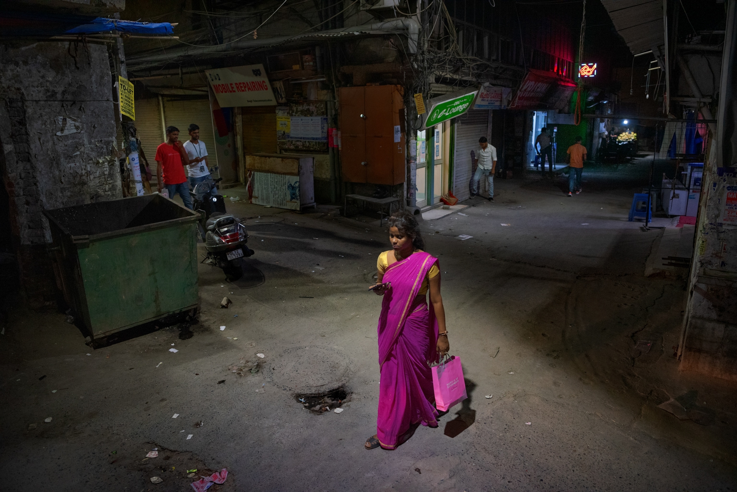 a woman walking alone on city streets