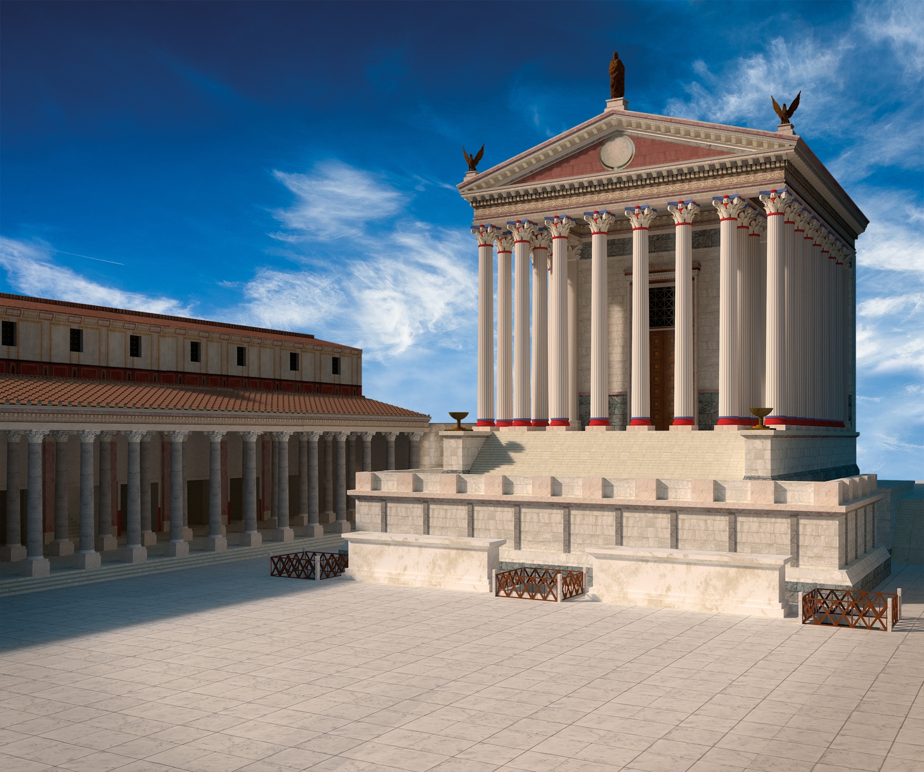 When he died, Caesar was in the midst of building two major structures in the Forum: the Basilica Julia and the Temple of Venus, shown here in this reconstruction.