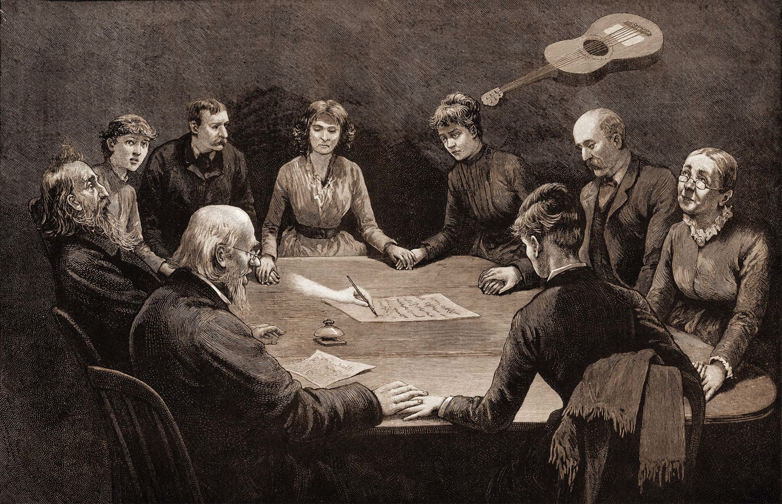 Spirit writing and levitating objects highlight this 1887 illustration of the kinds of manifestations experienced at a séance.