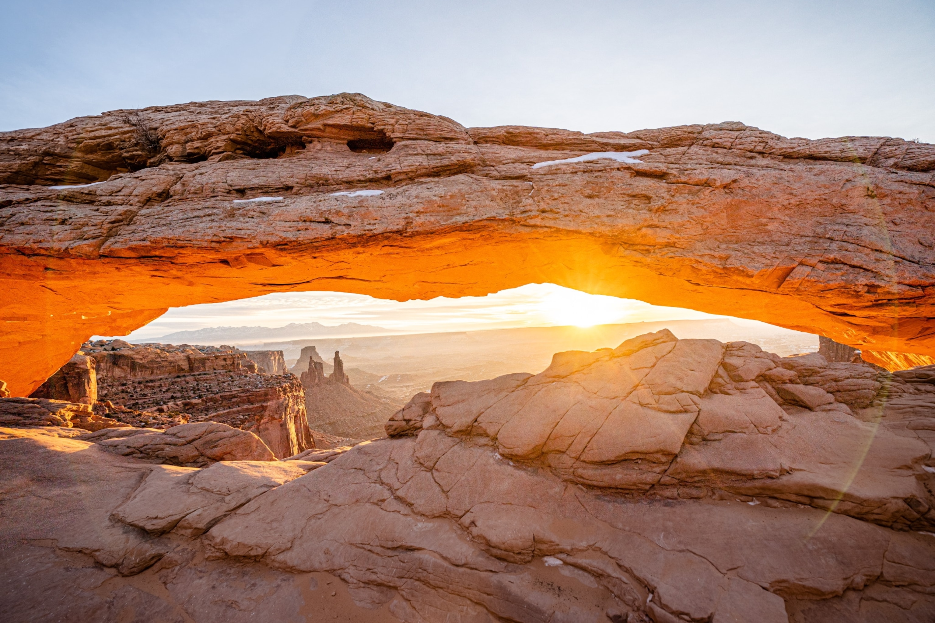 Sunset view through rock arch