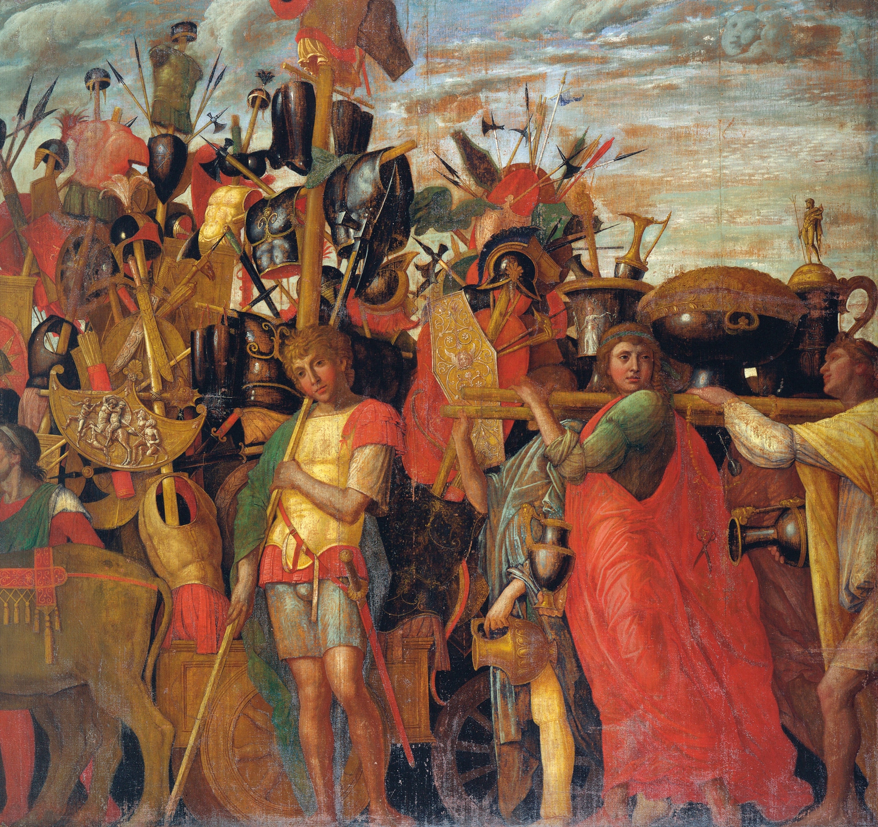 soldiers’ armor, weapons, and other trophies carried through the crowds