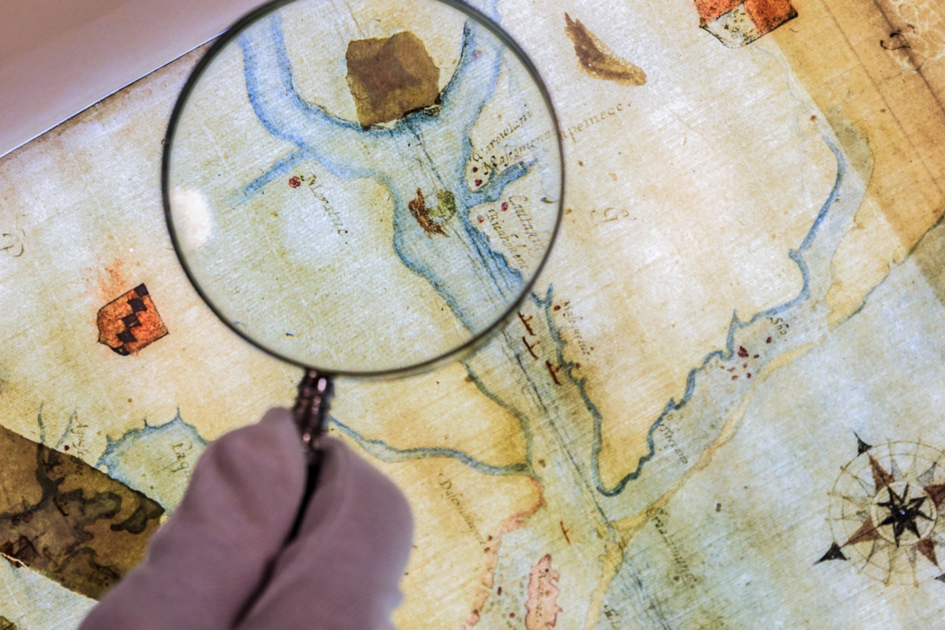 a map with a magnifying glass over it