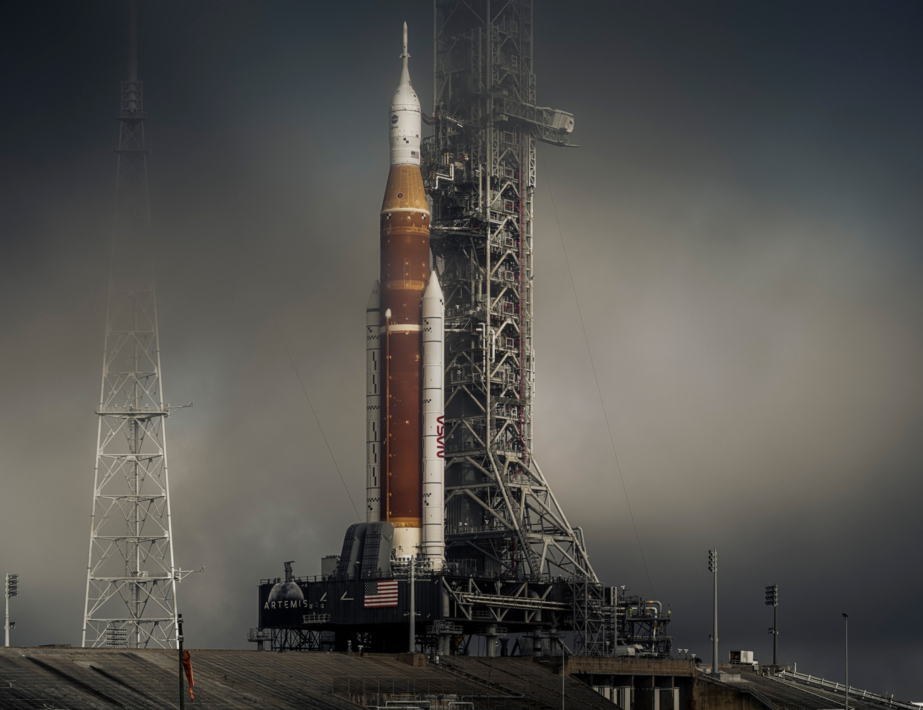 The Artemis-1 rocket seen as the fog clear at pad 39B during a "wet dress" rollout at Kennedy Space Center in Florida