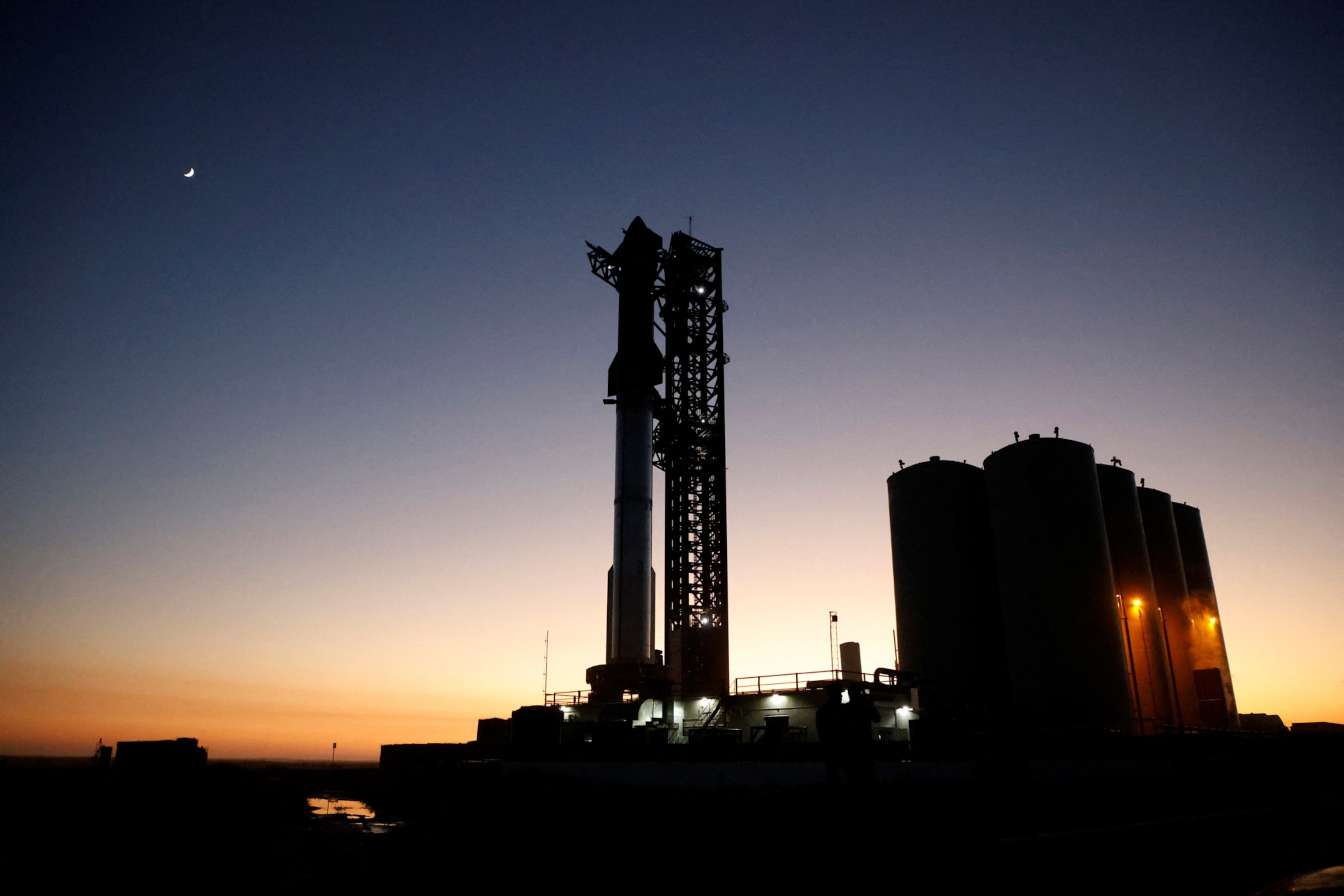 SpaceX's next-generation Starship spacecraft atop its powerful Super Heavy rocket prepared for launch