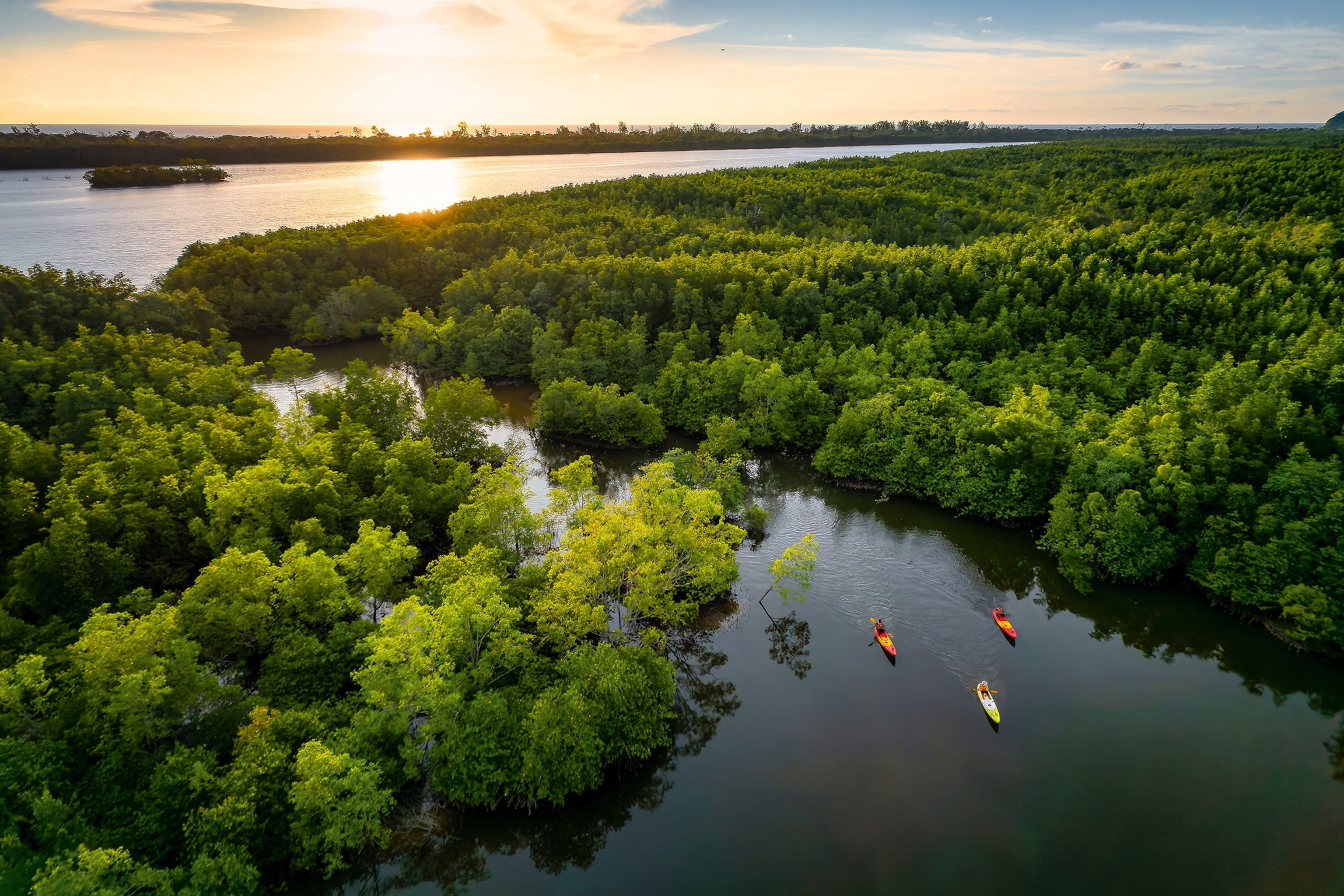 Wide angle shot of three kayaks on a river
