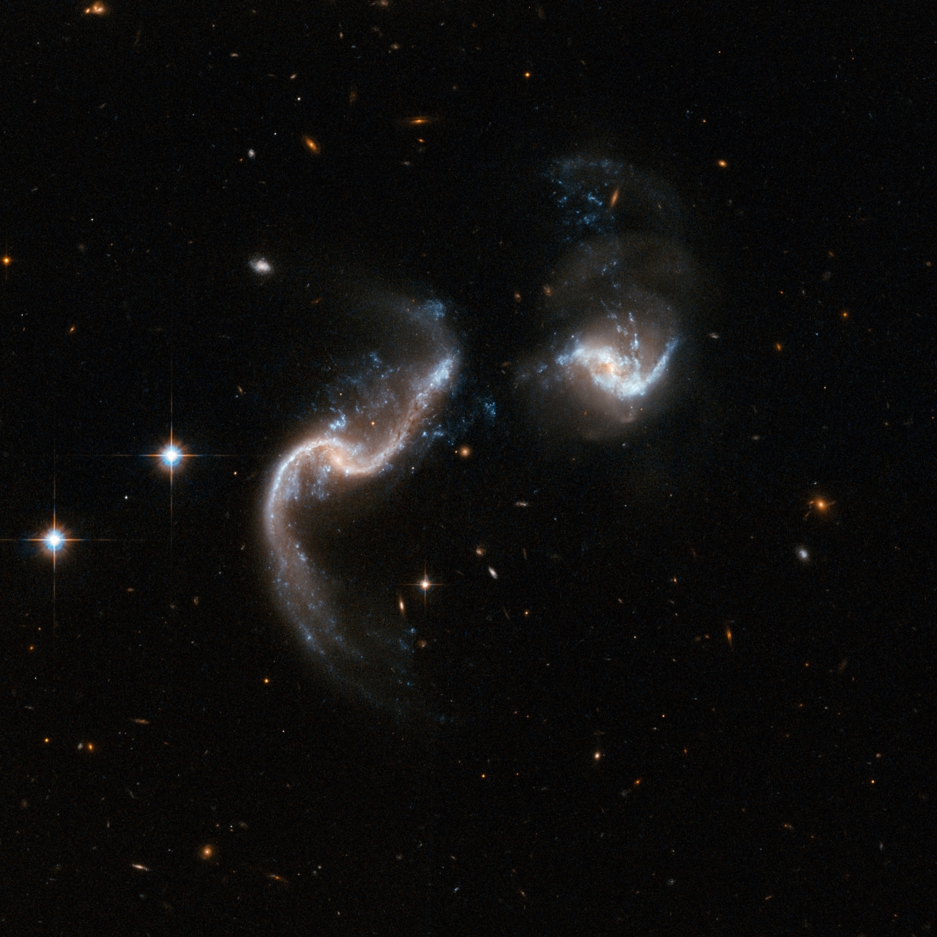 Two spiral galaxies in an early stage of merging