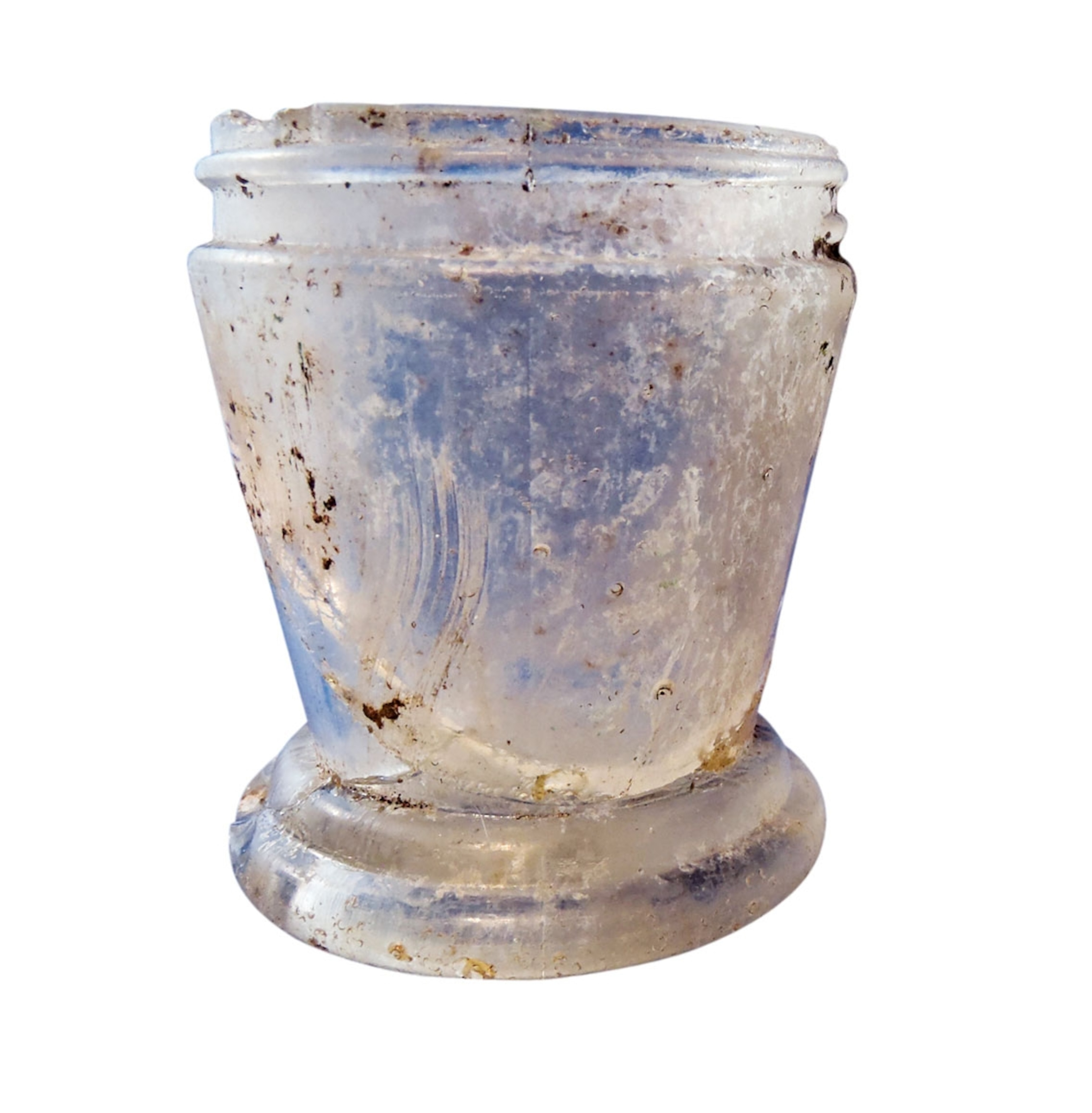 a glass jar believed to have held freckle cream
