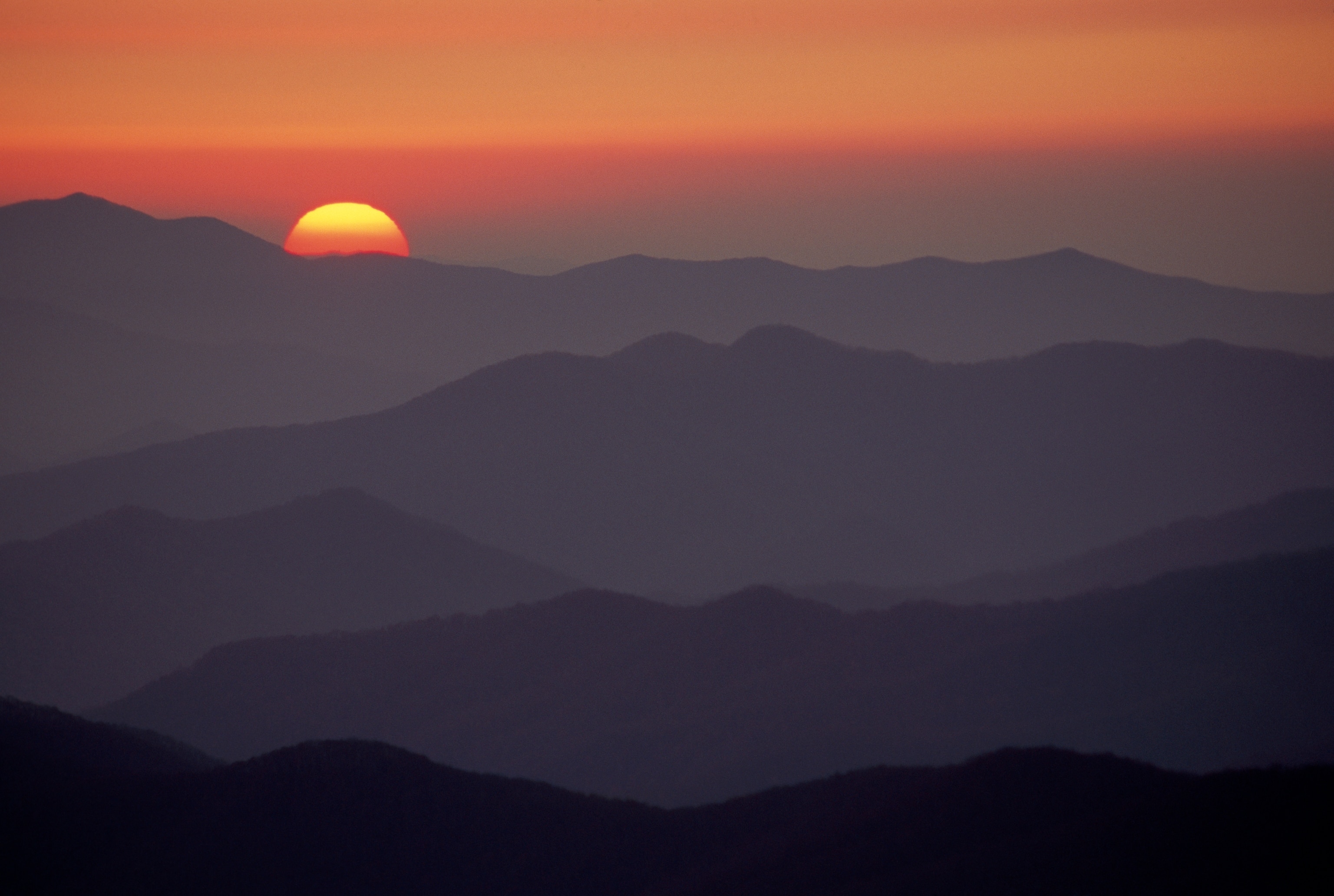 View of the sunset across the mountain ridges from atop Clingman’s Dome in Great Smoky Mountains National Park in Tennessee