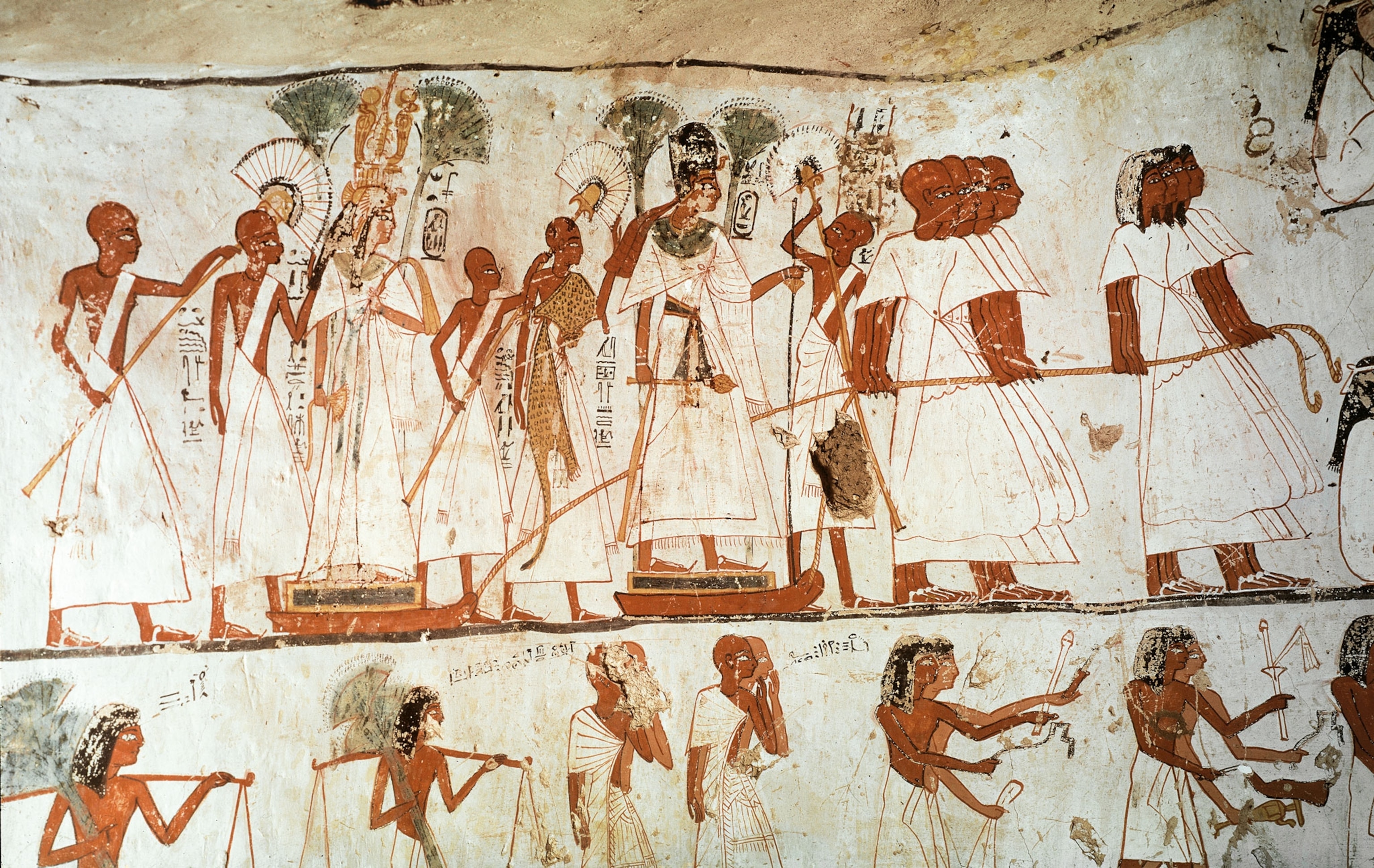 A painting of people pulling statues on sleds