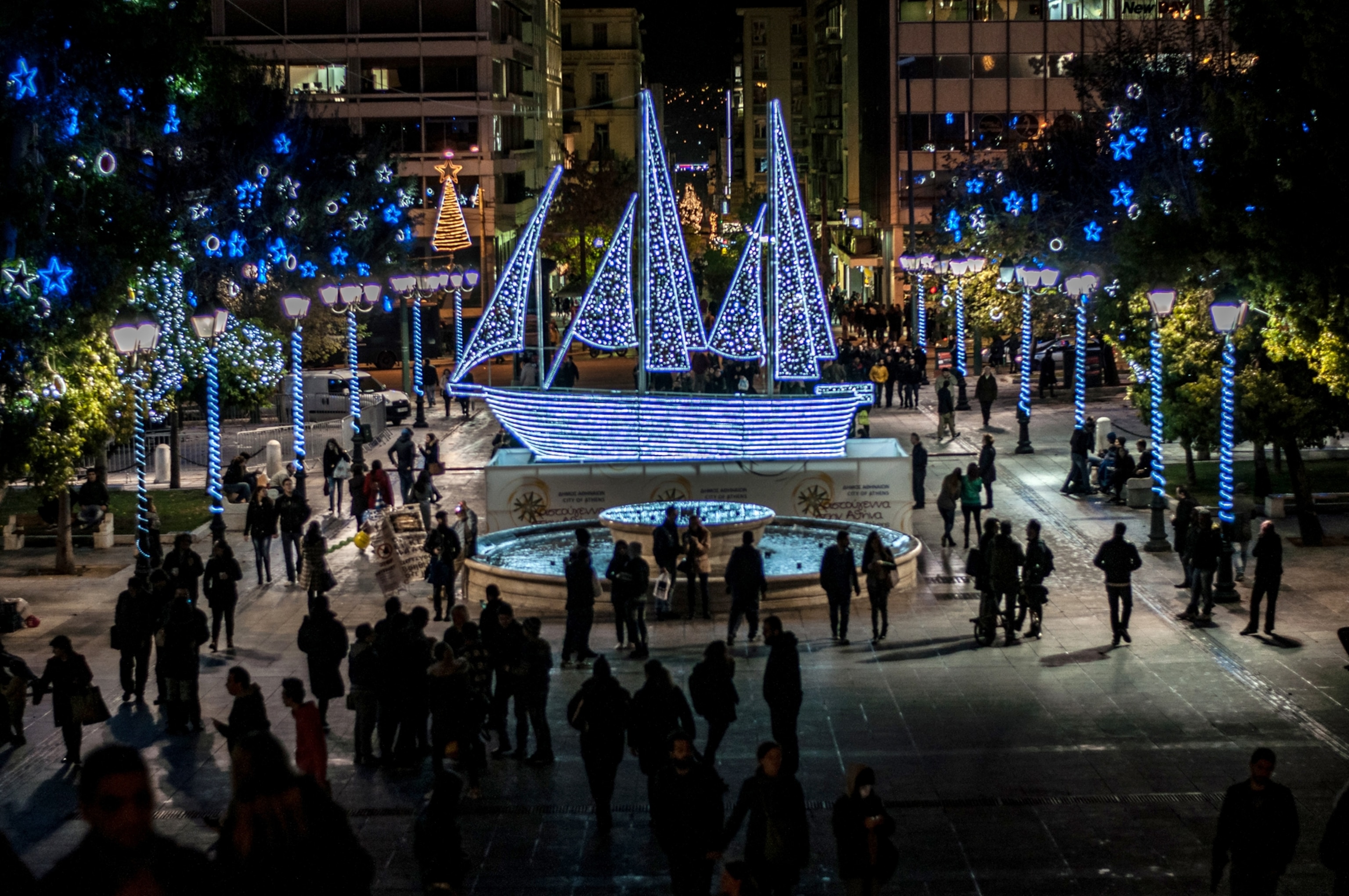Syntagma Square features a ship decorated with lights at Christmas time in Athens, Greece