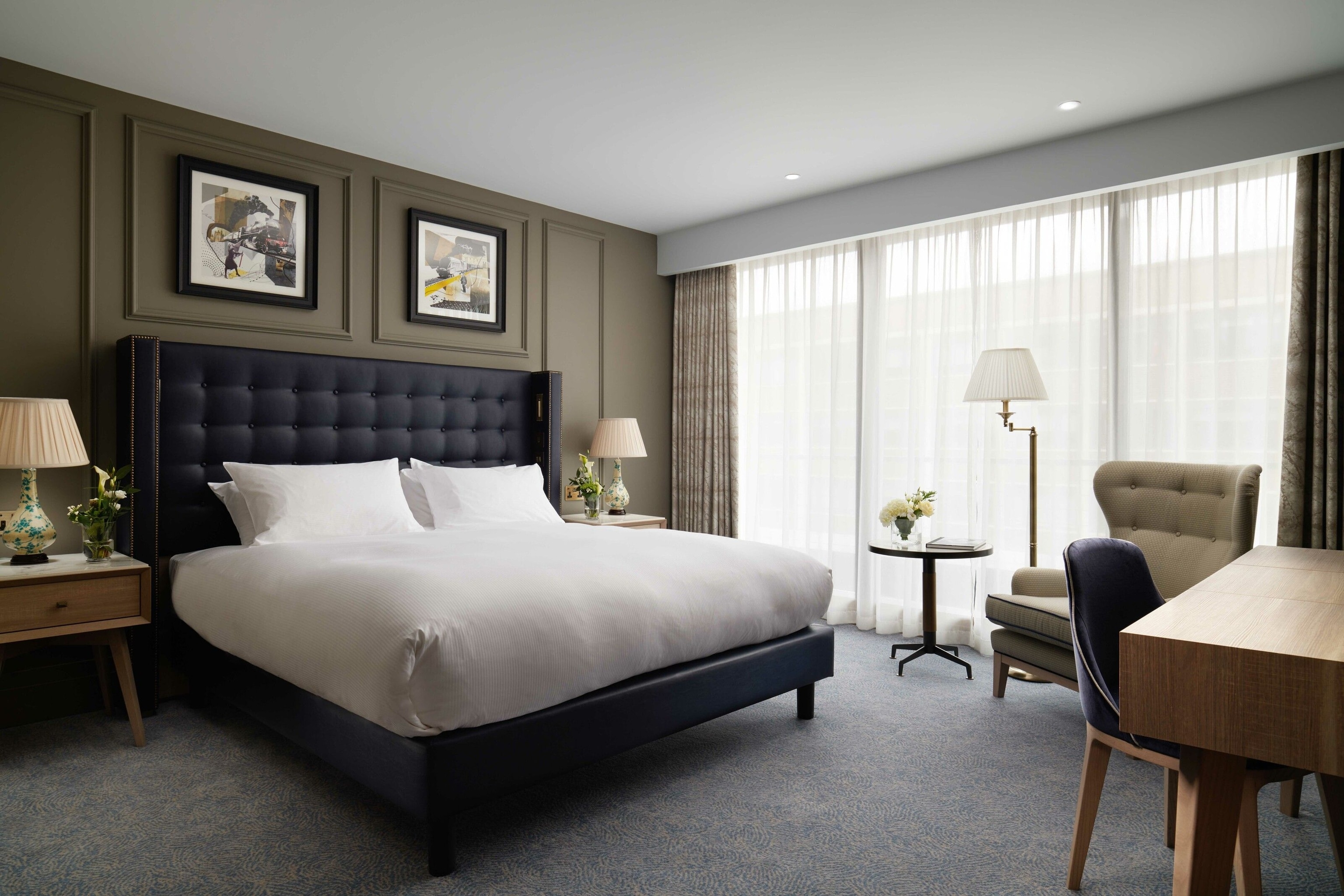 A white double bed at The Grand.