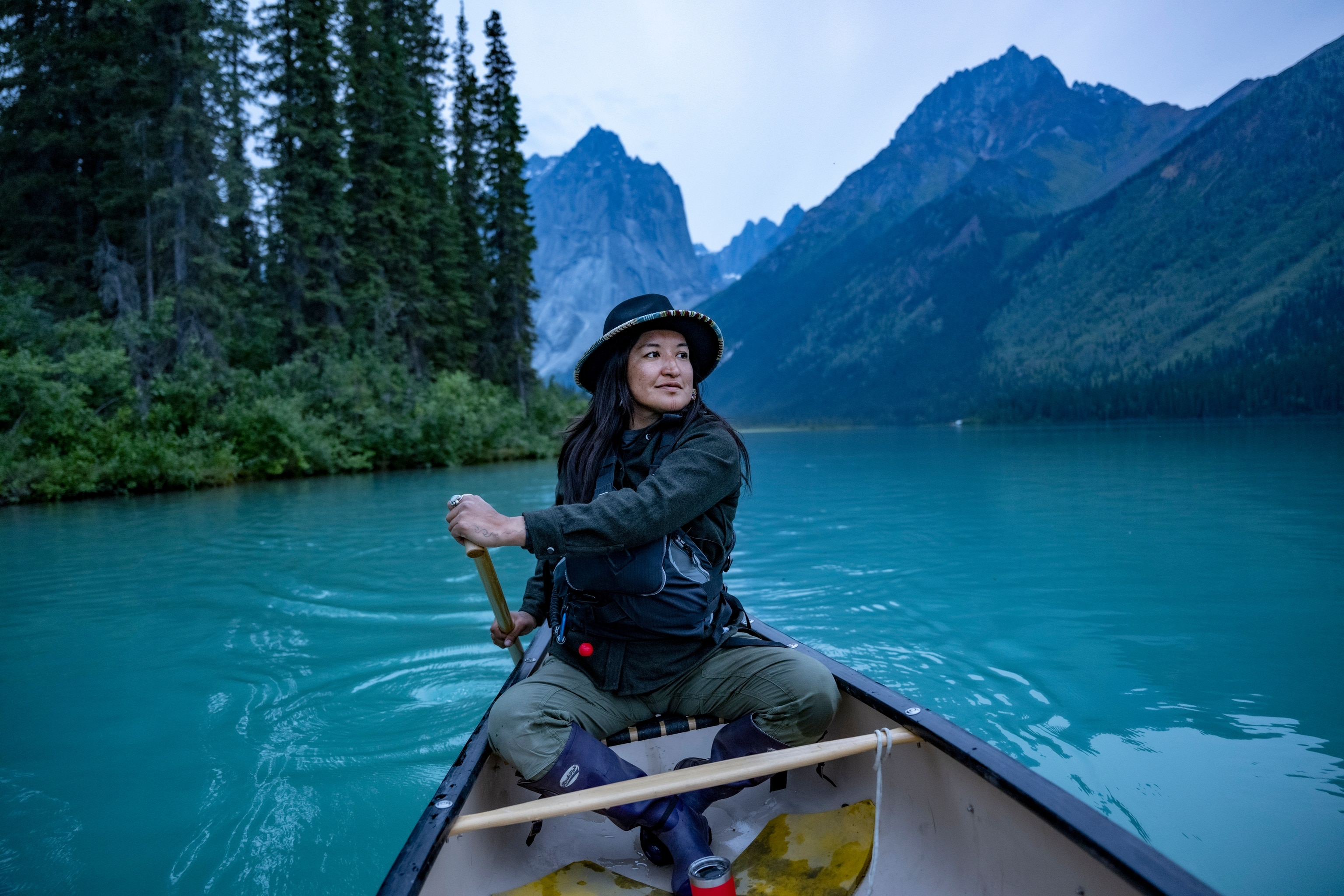 Teetl’it Gwich’in guide and activist Bobbi Rose glides across Glacier Lake in the remote Northwest Territories of Canada. Her people have stewarded these lands for generations, and she embodies a deep reverence for this connection.