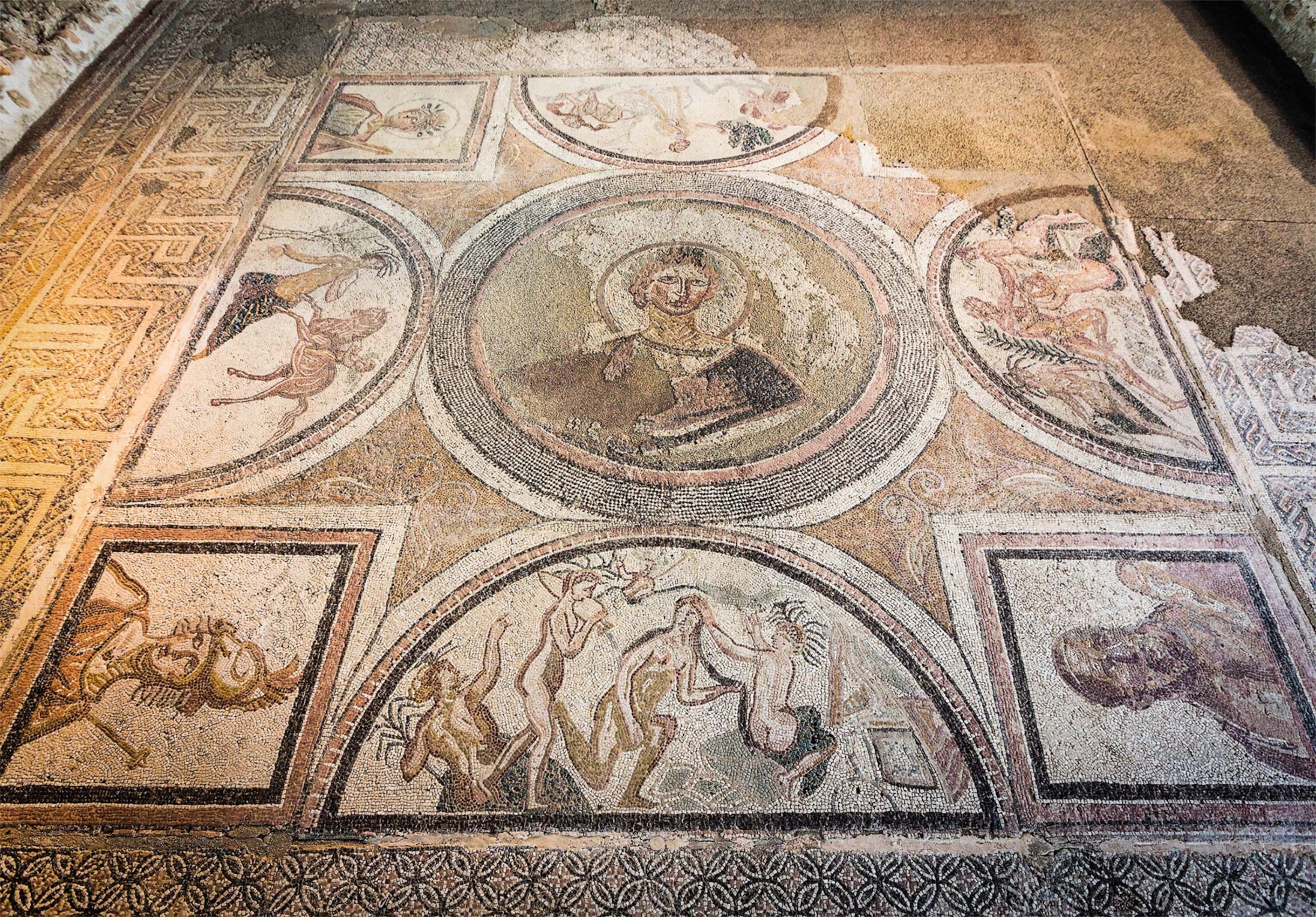 Eight separate scenes on the floor mosaic include a lady with a halo of gold, portraits of Roman divinities, and mythological scenes from Ovid’s "Metamorphoses"