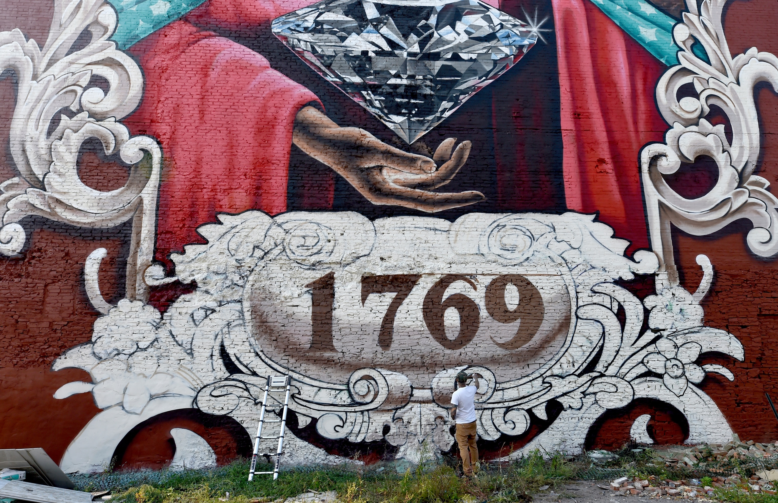 A mural spray painted by Evan Lovett of Philadelphia