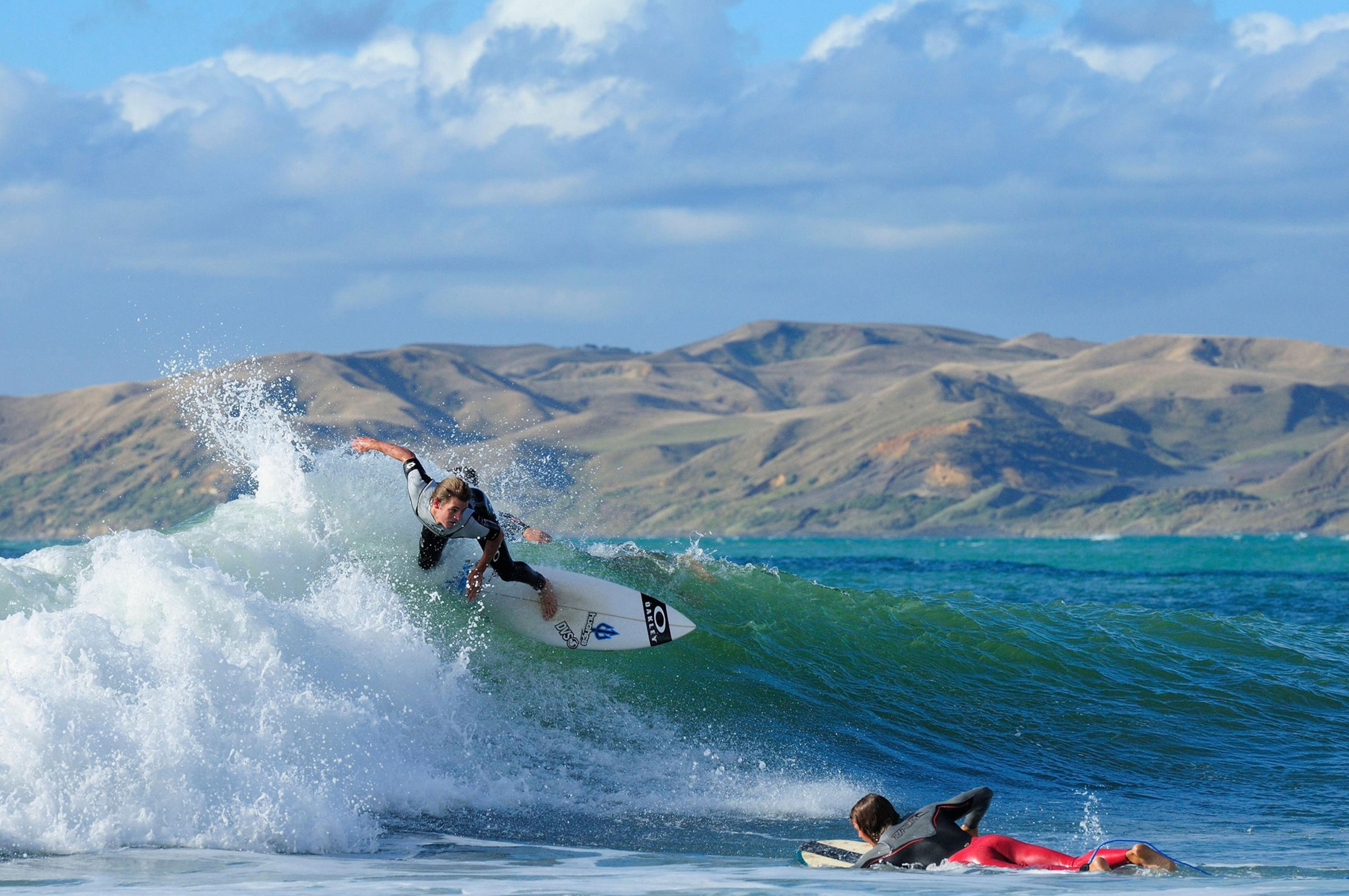 a surfer in Raglan, New Zealand