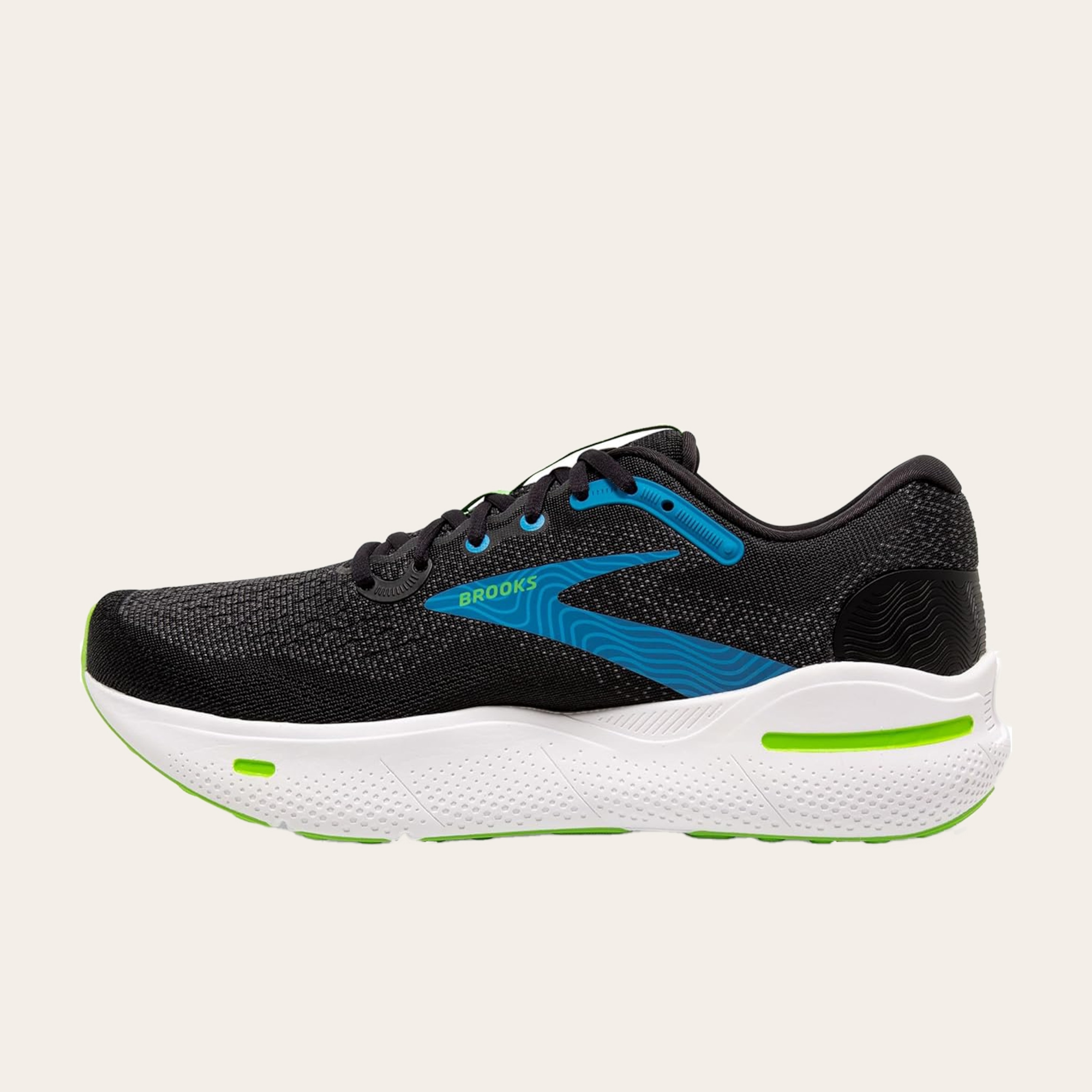 An image of black sneakers with neon green accents.
