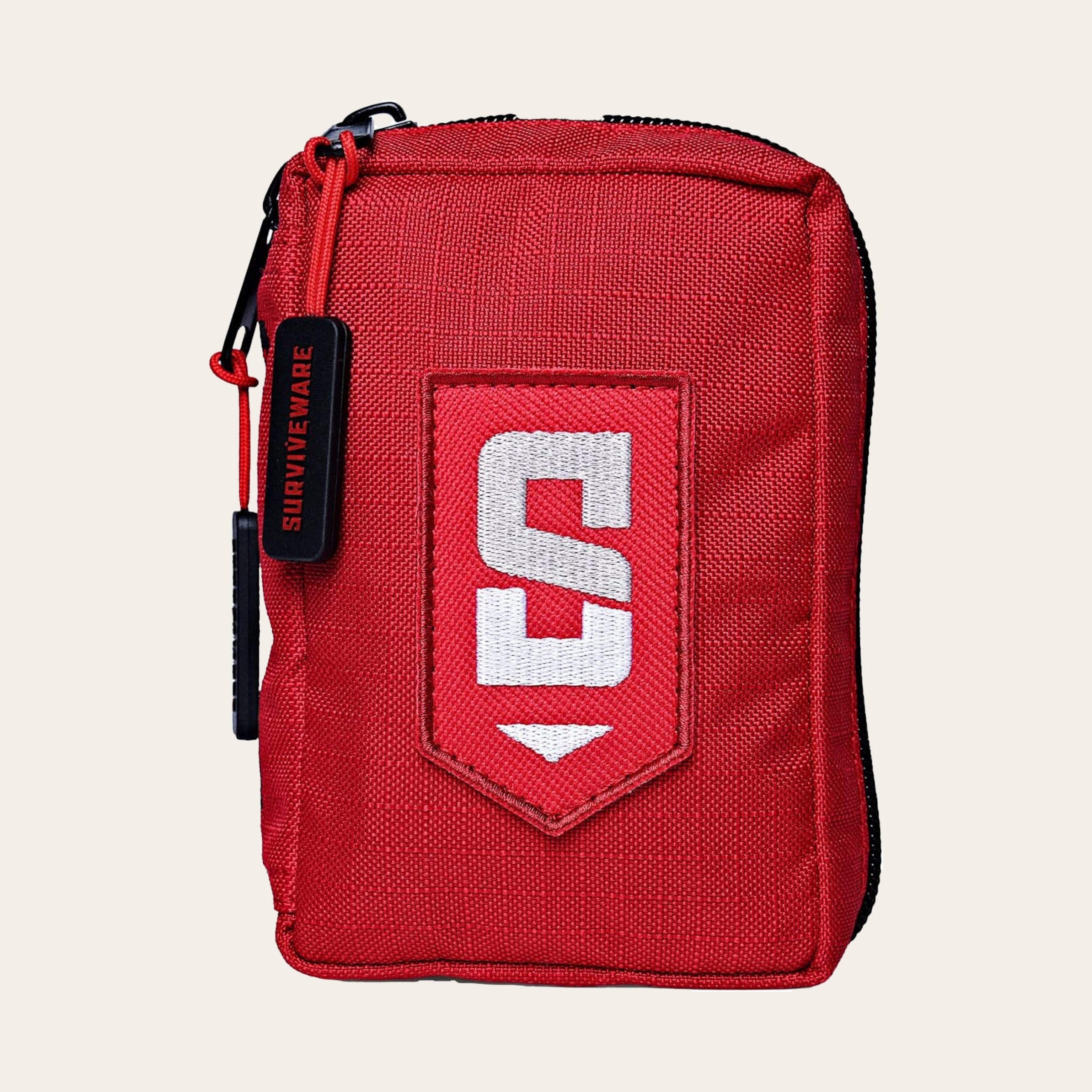 A red Surviveware first aid kit