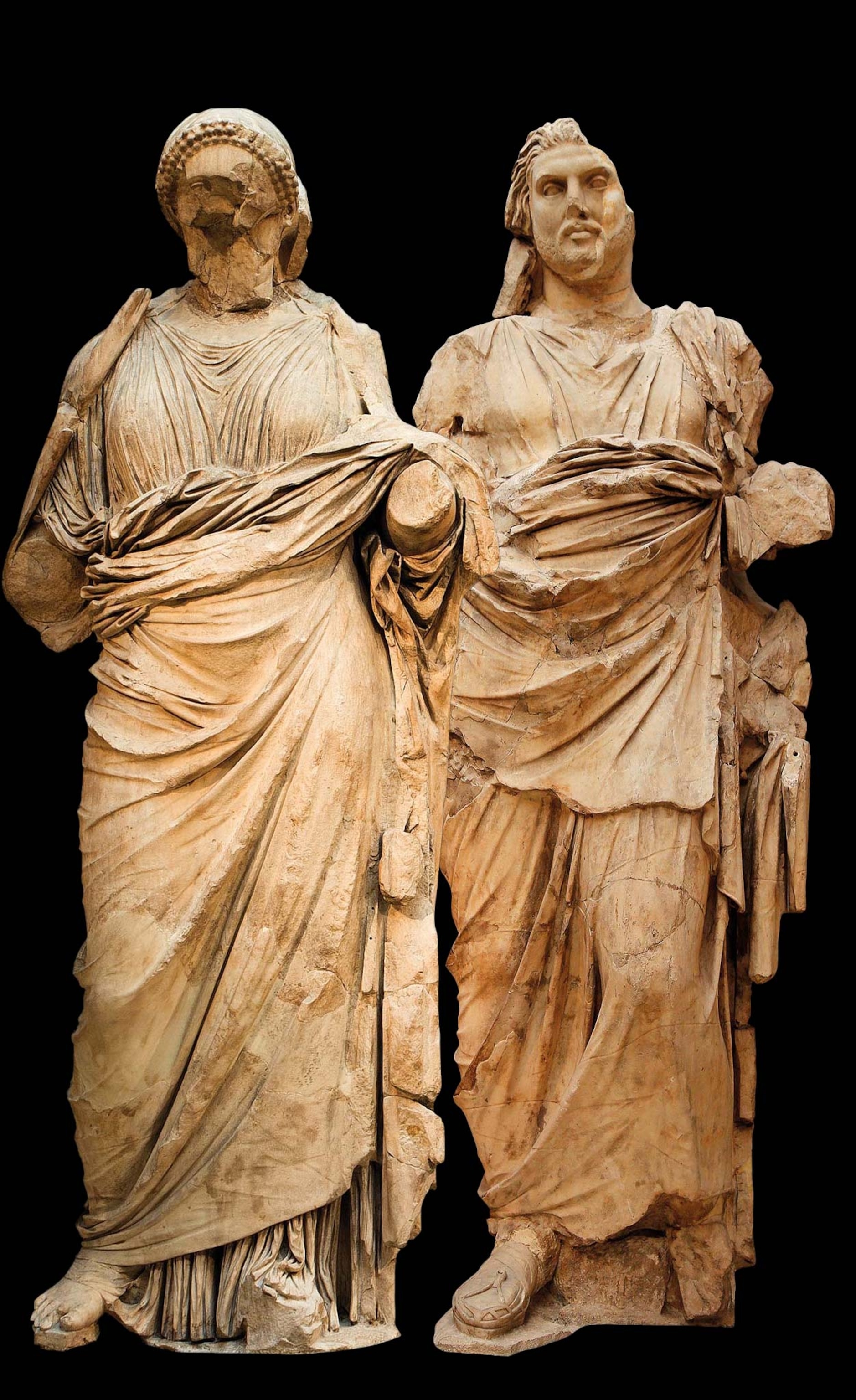 Two sculptures from the Mausoleum, a man and woman
