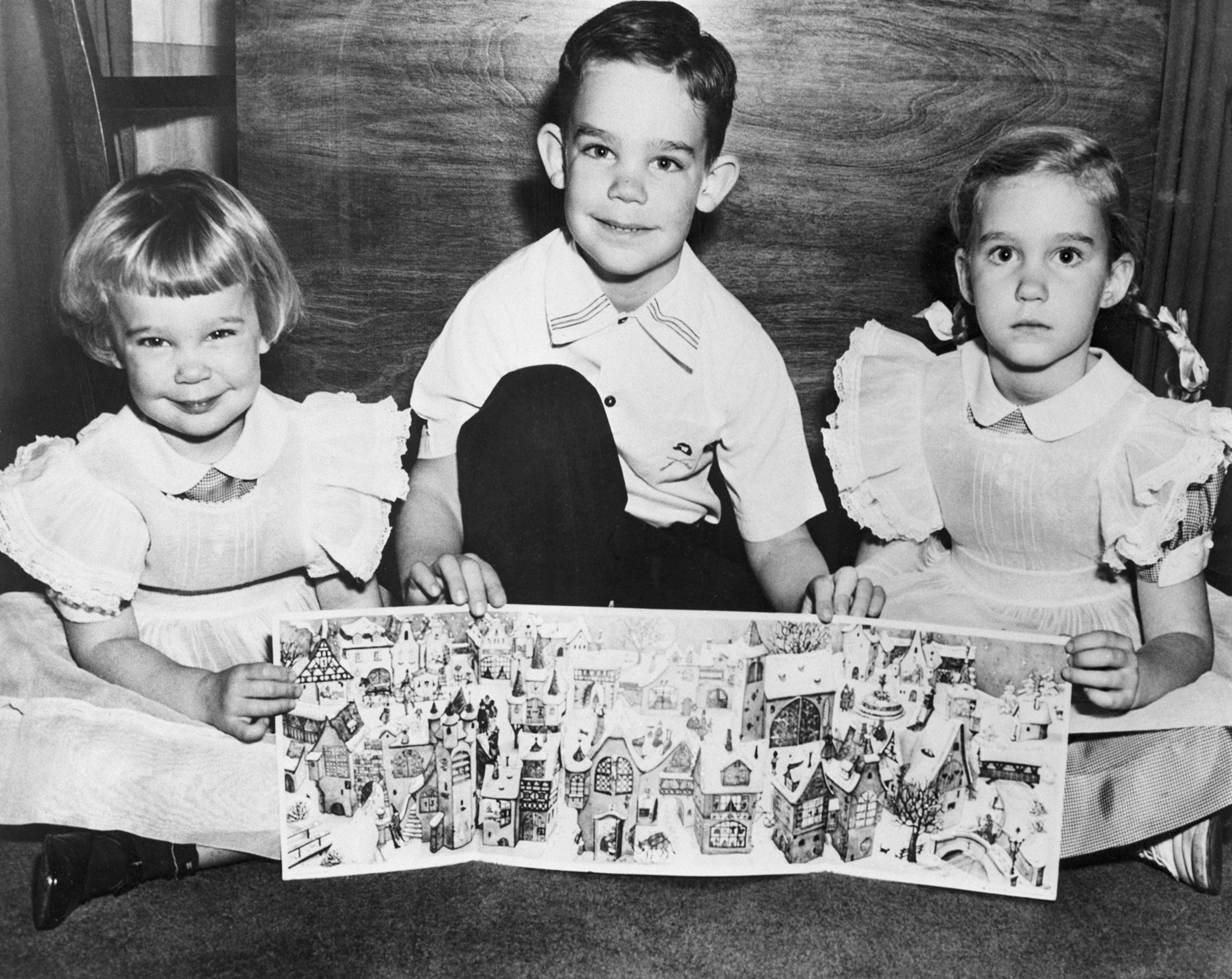 President Eisenhower's children opening an Advent calendar