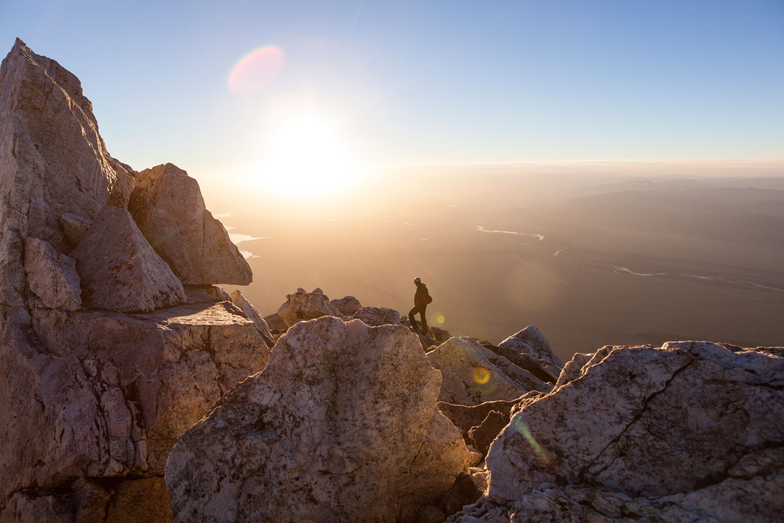 a man standing near the summit of Teewinot Mountain, Grand Teton National Park, Wyoming