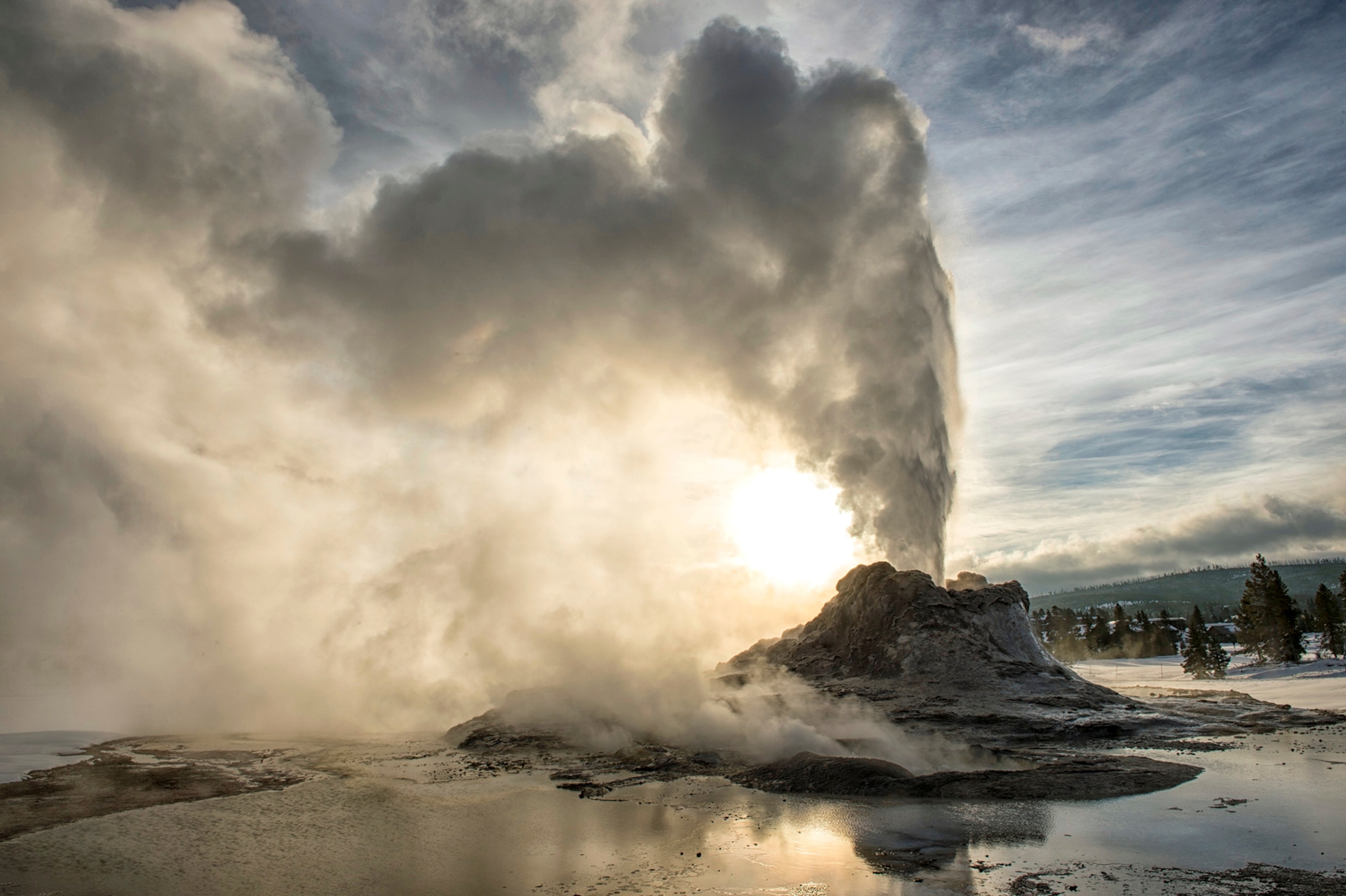 a geyser erupting in Yellowstone National Park, Wyoming