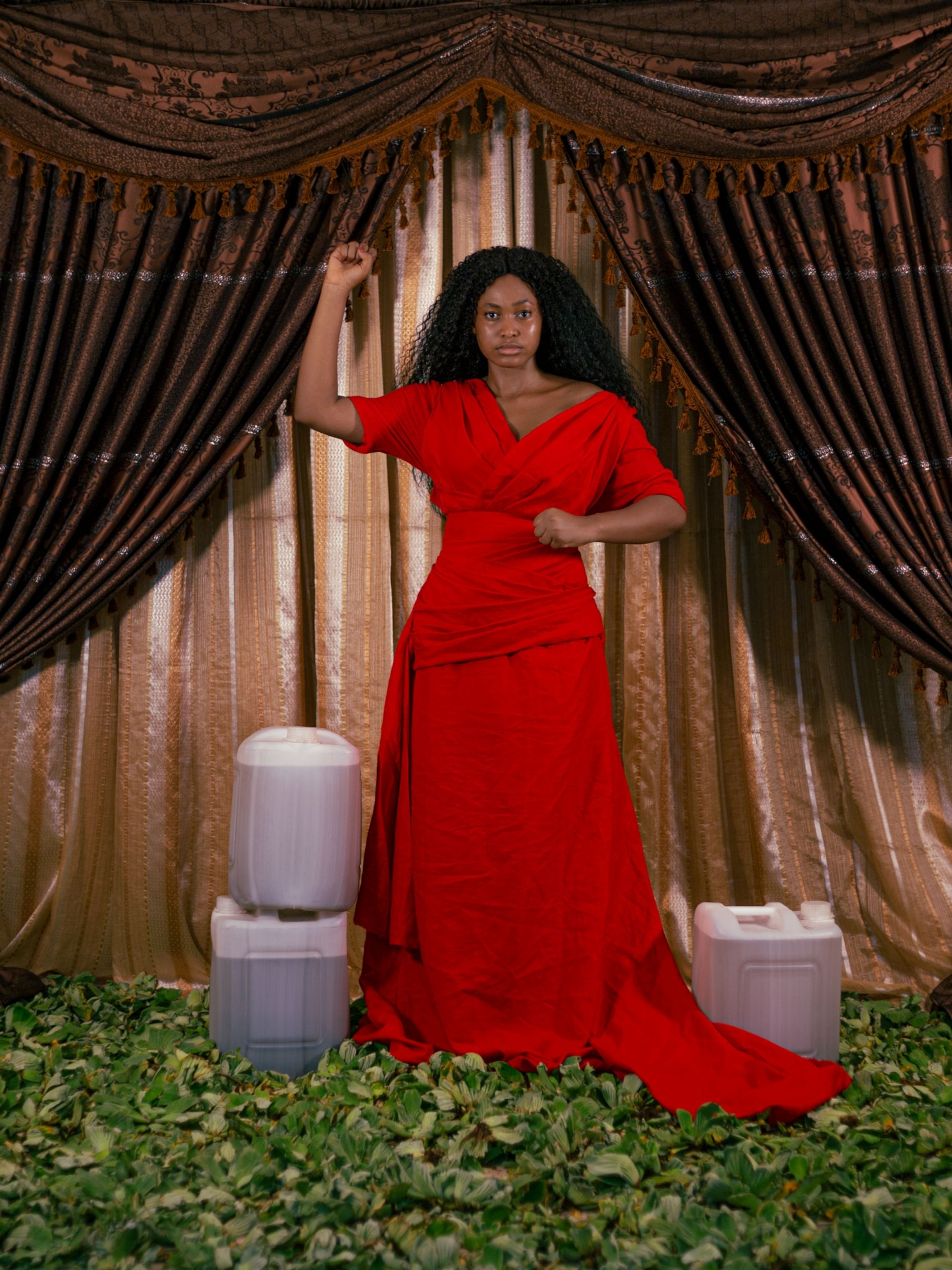 a woman dressed in a red dress