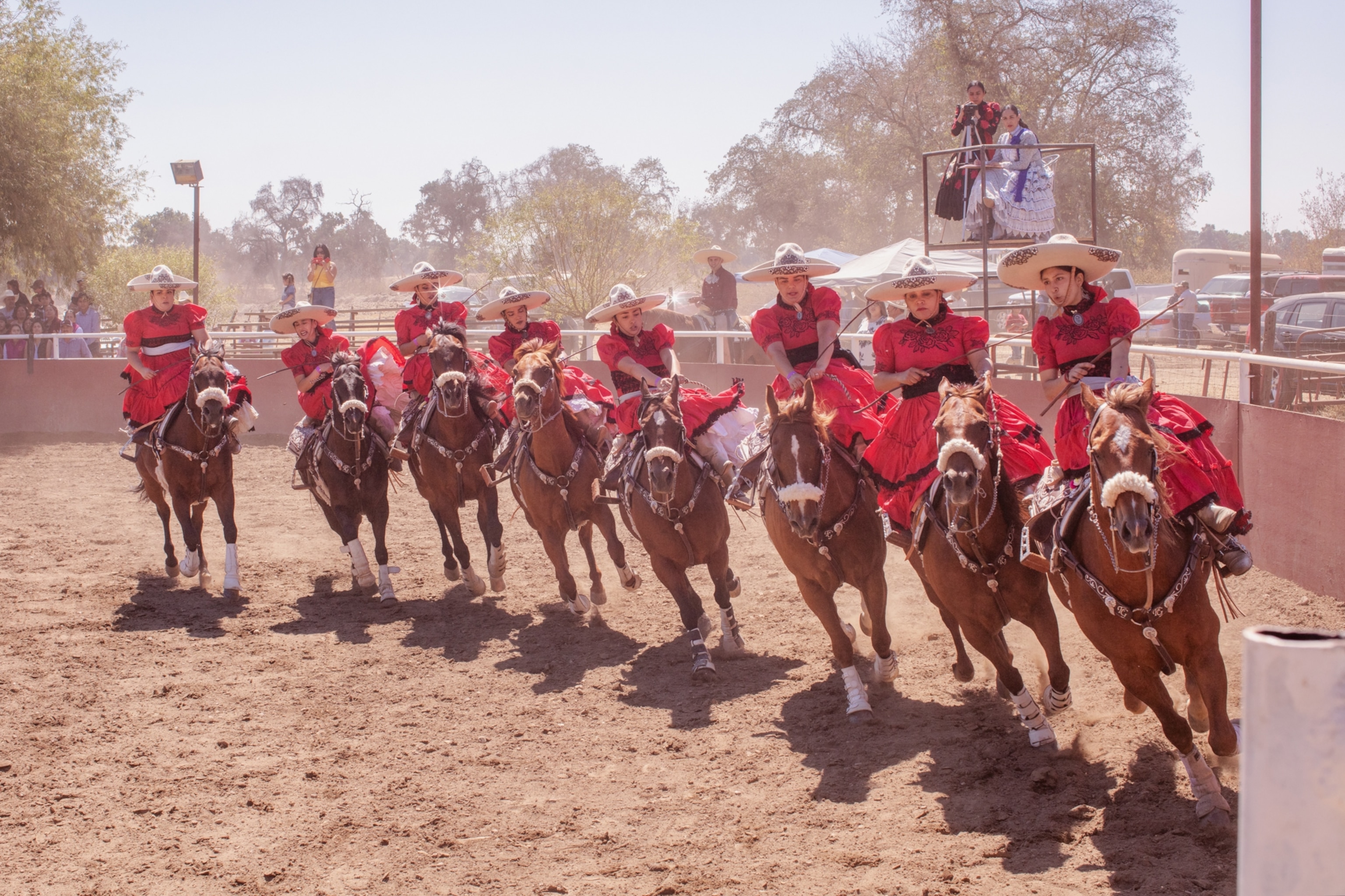 women ride a horse during a rodeo in California