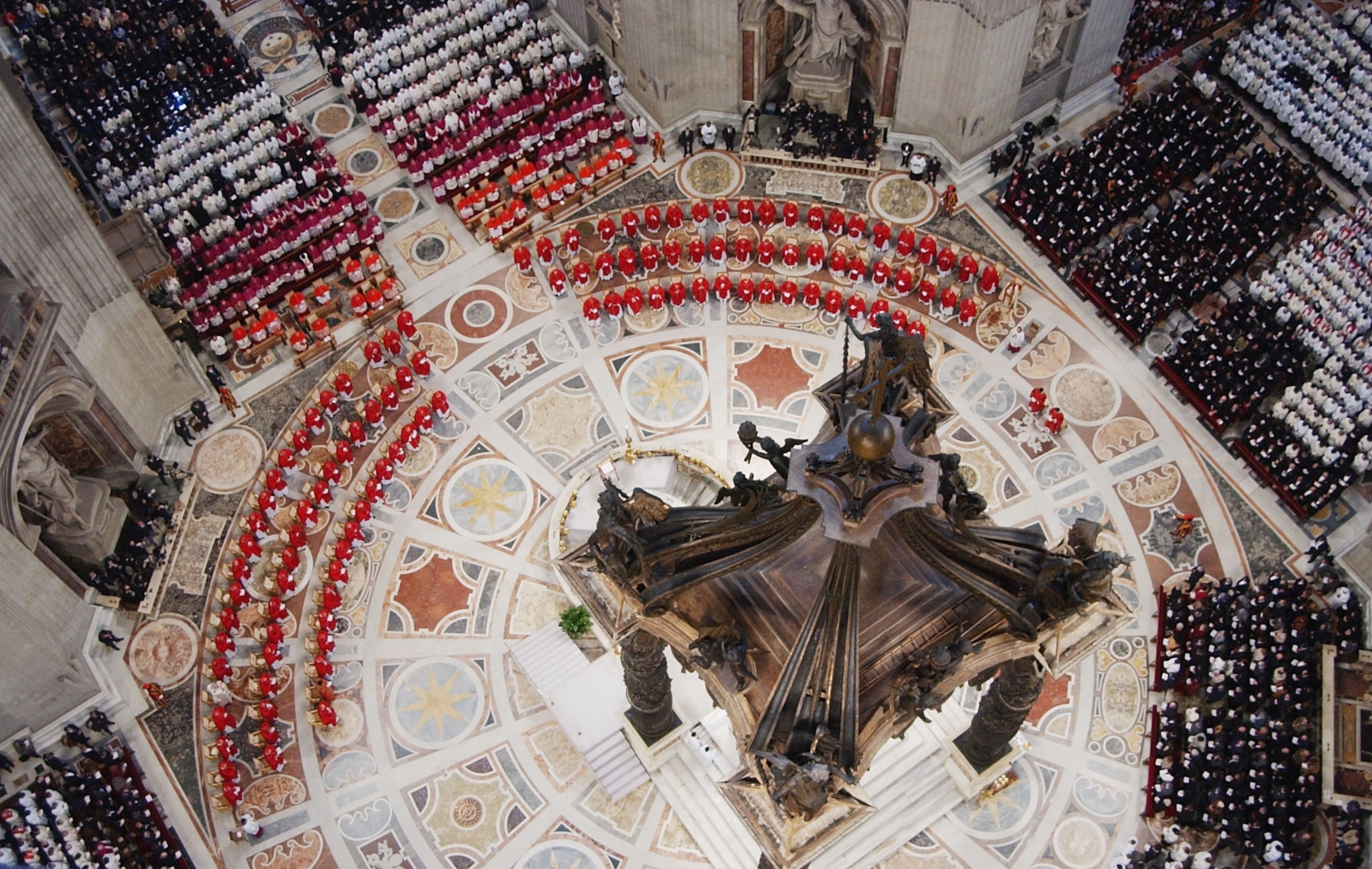 A view from above during a final Mass in Saint Peter's Basilica before the start of a conclave to elect a new Pope.
