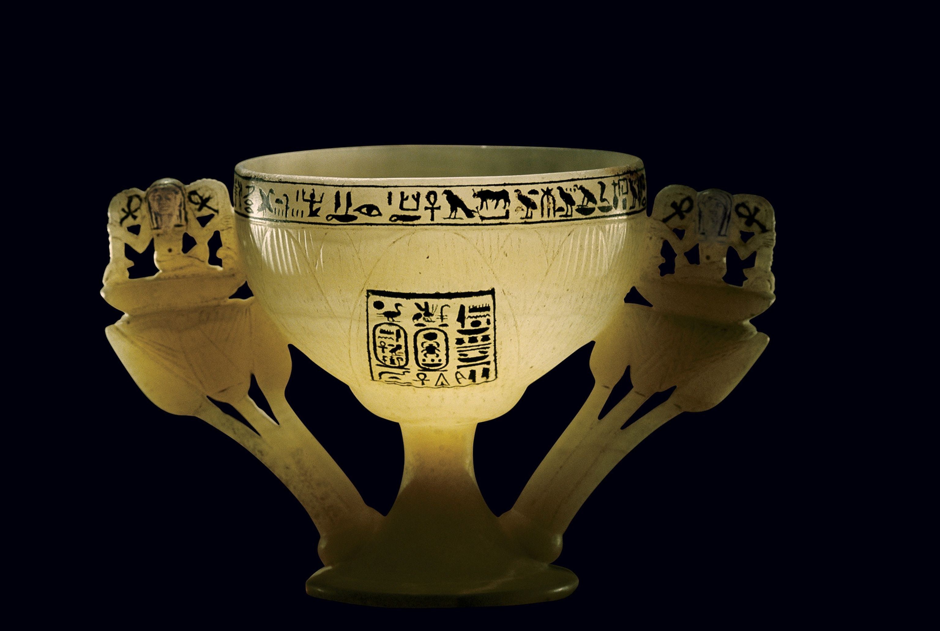 This drinking cup of translucent calcite was carved in the shape of an open lotus blossom, a symbol of rebirth.