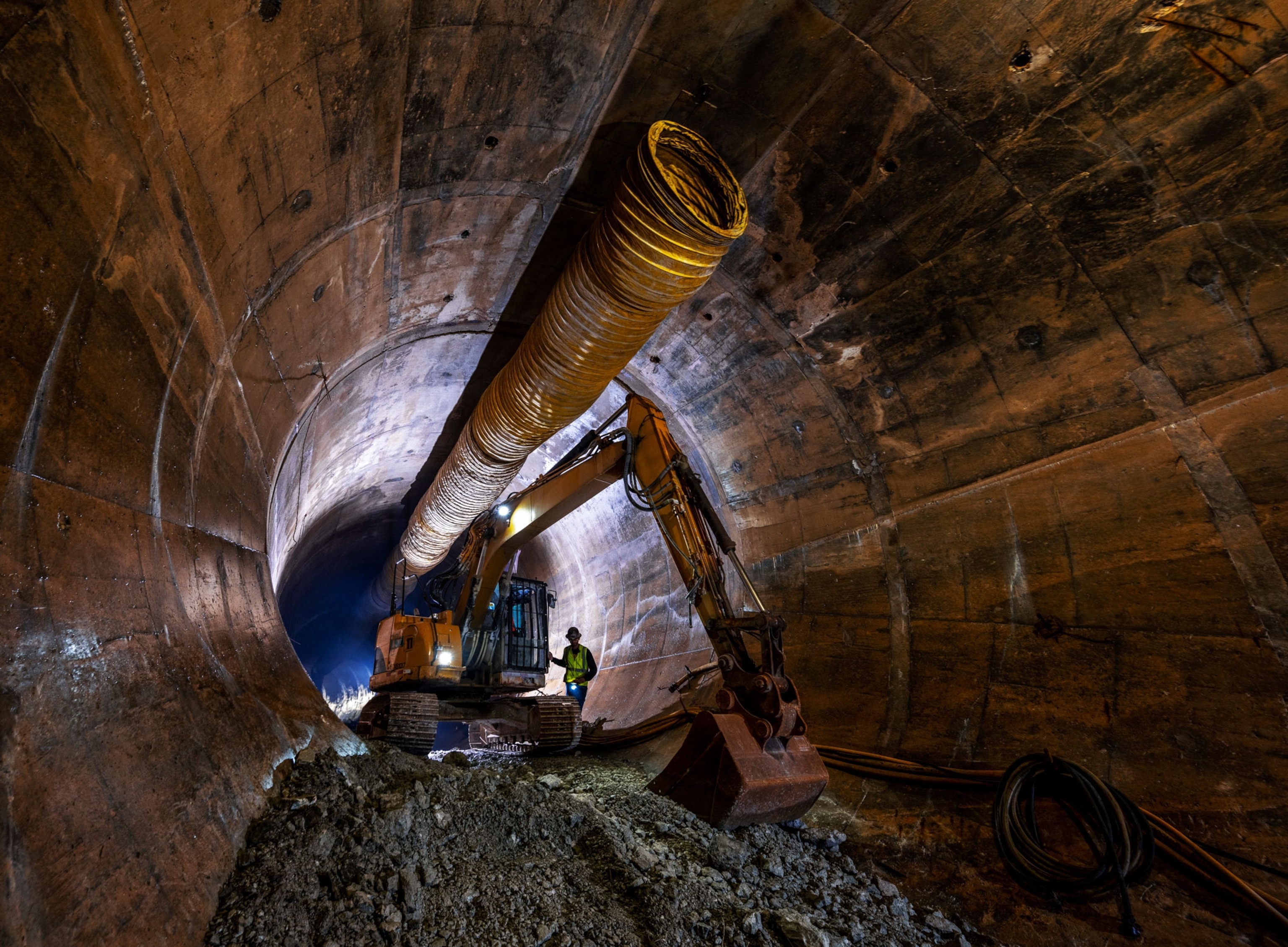 Beneath Chicago, a bulldozer works on the city’s Tunnel and Reservoir Plan.