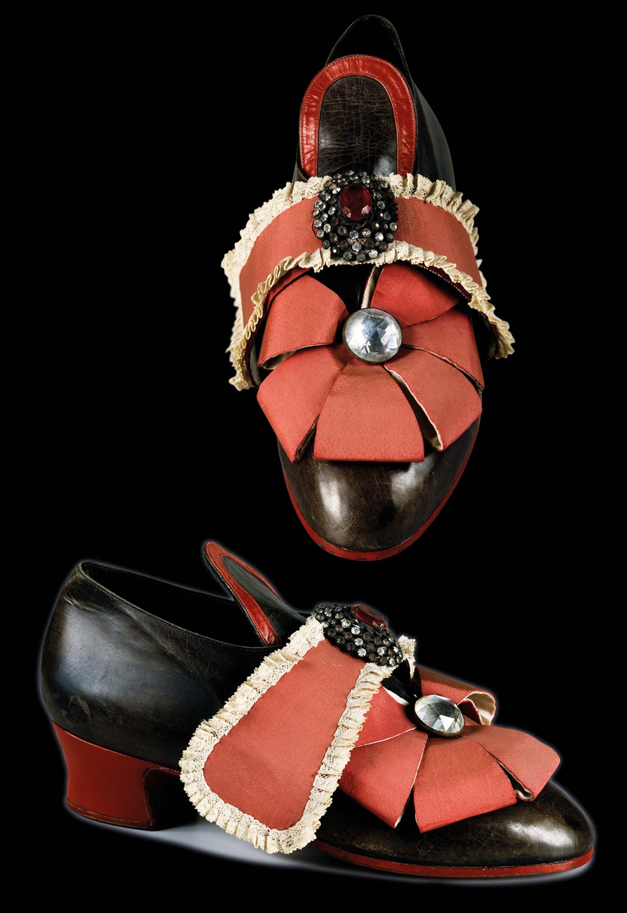 A replica pair of Louis XIV's red and black heeled shoes