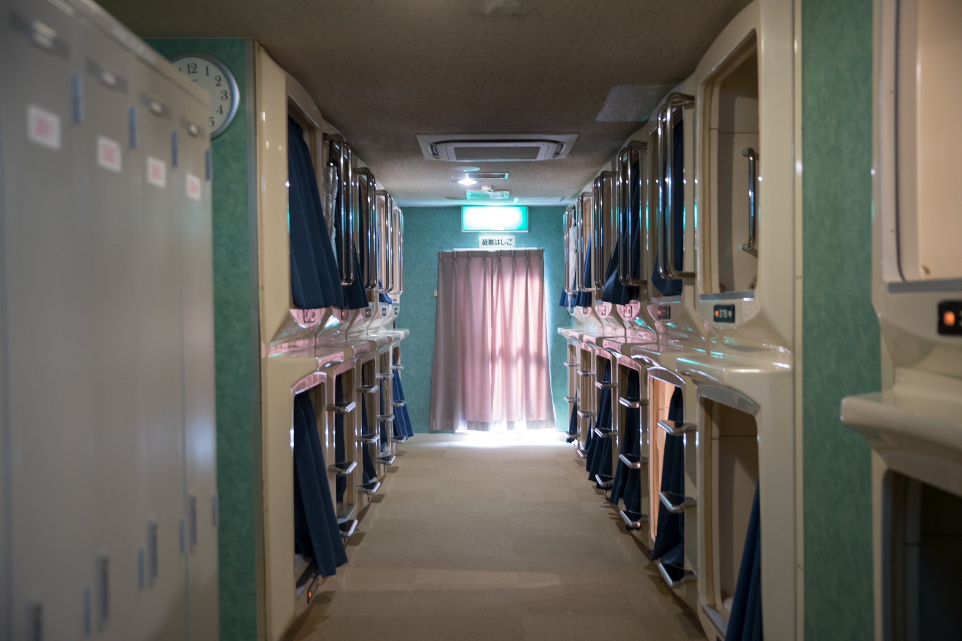 an interior view of capsule beds in a hotel