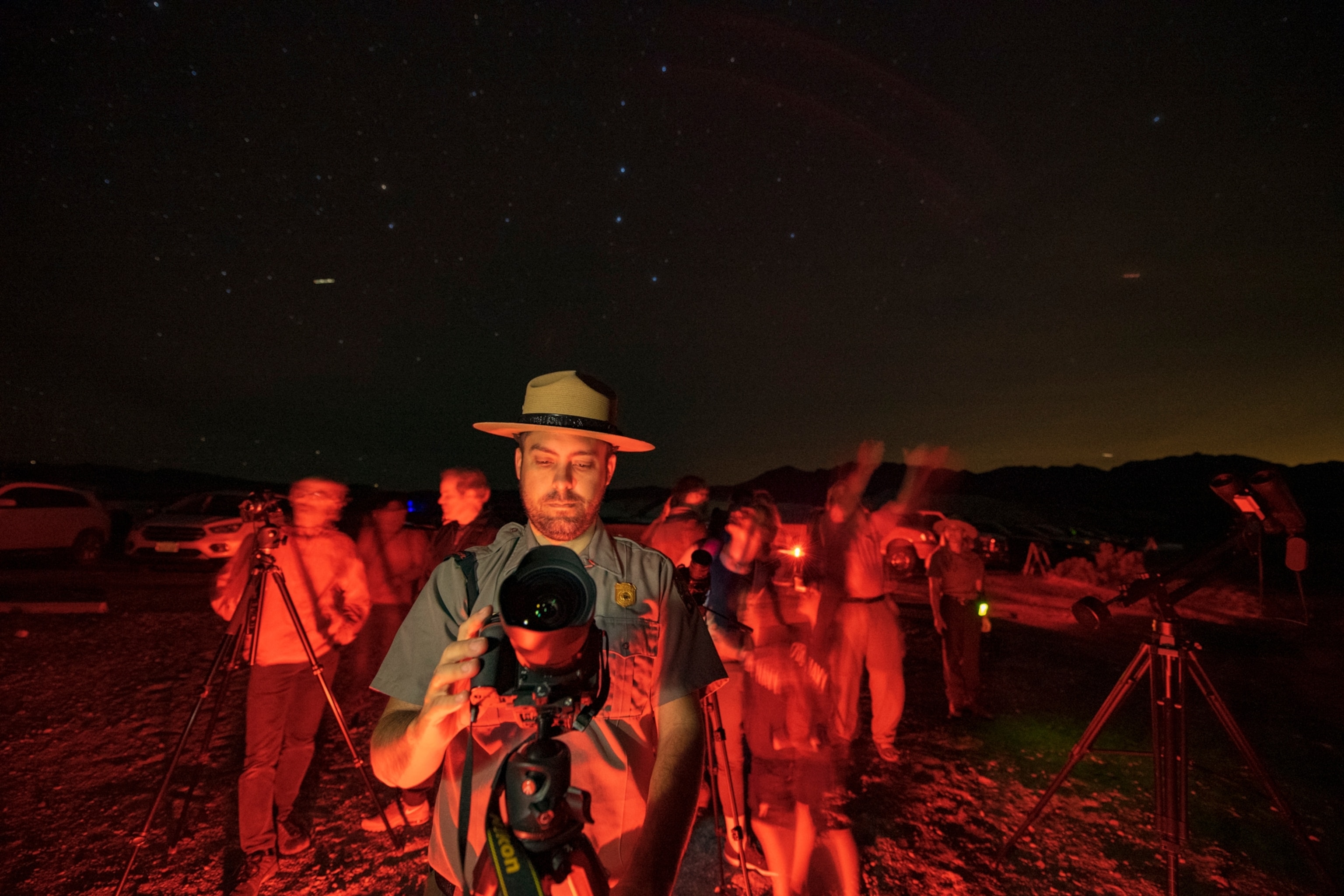 a park ranger with a telescope