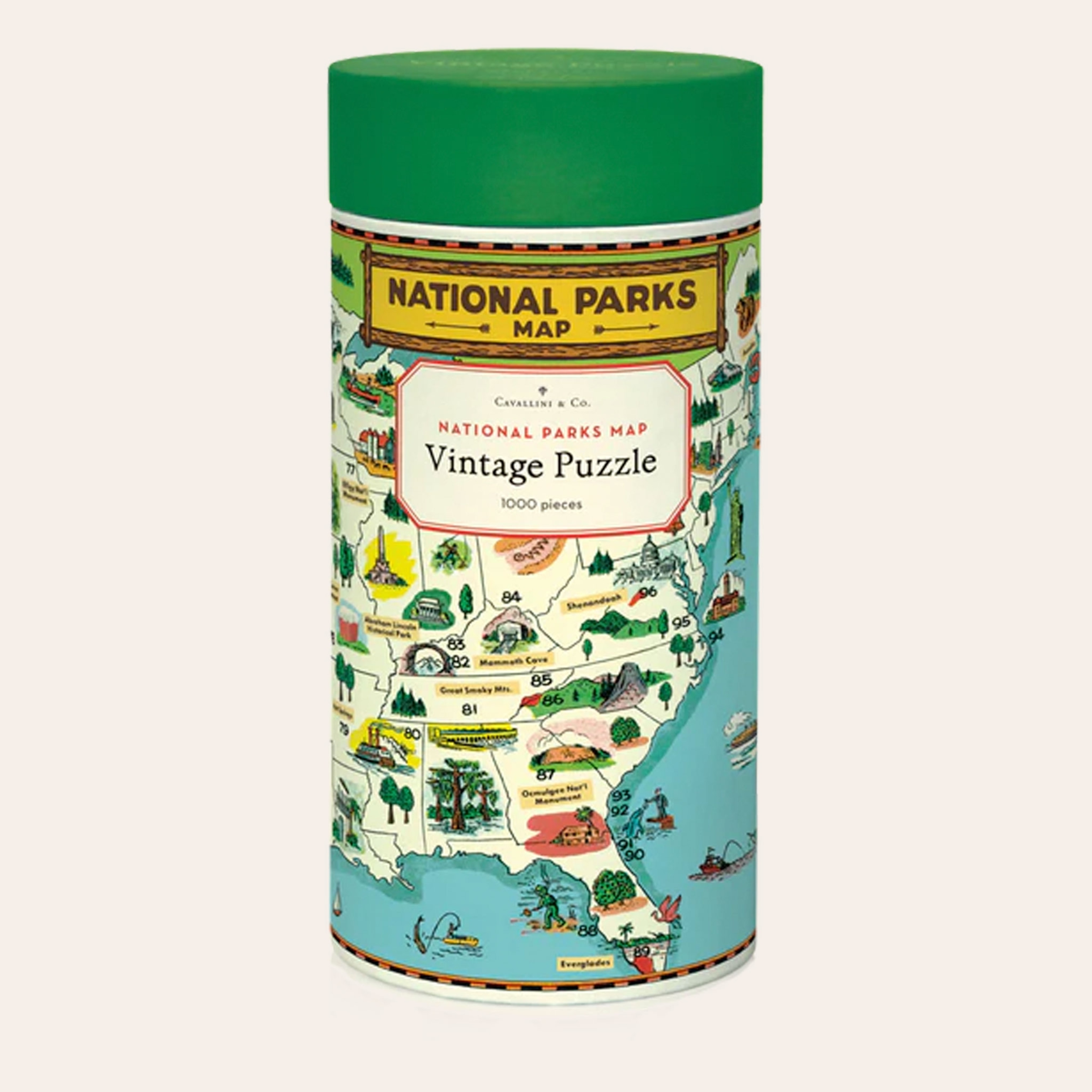 Vintage jigsaw puzzle, packaged in a 10-inch long cardboard tube, with a picture of the united states and it's national parks.