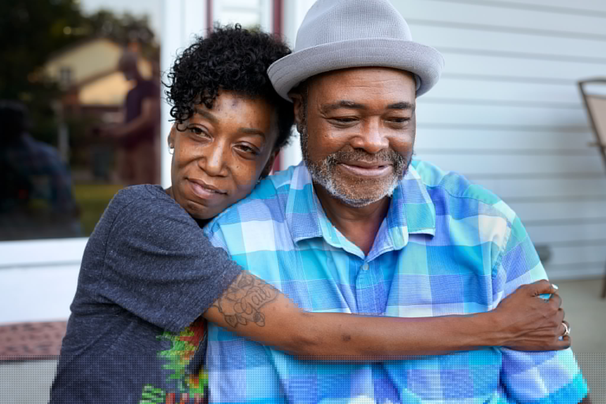 woman embracing man.