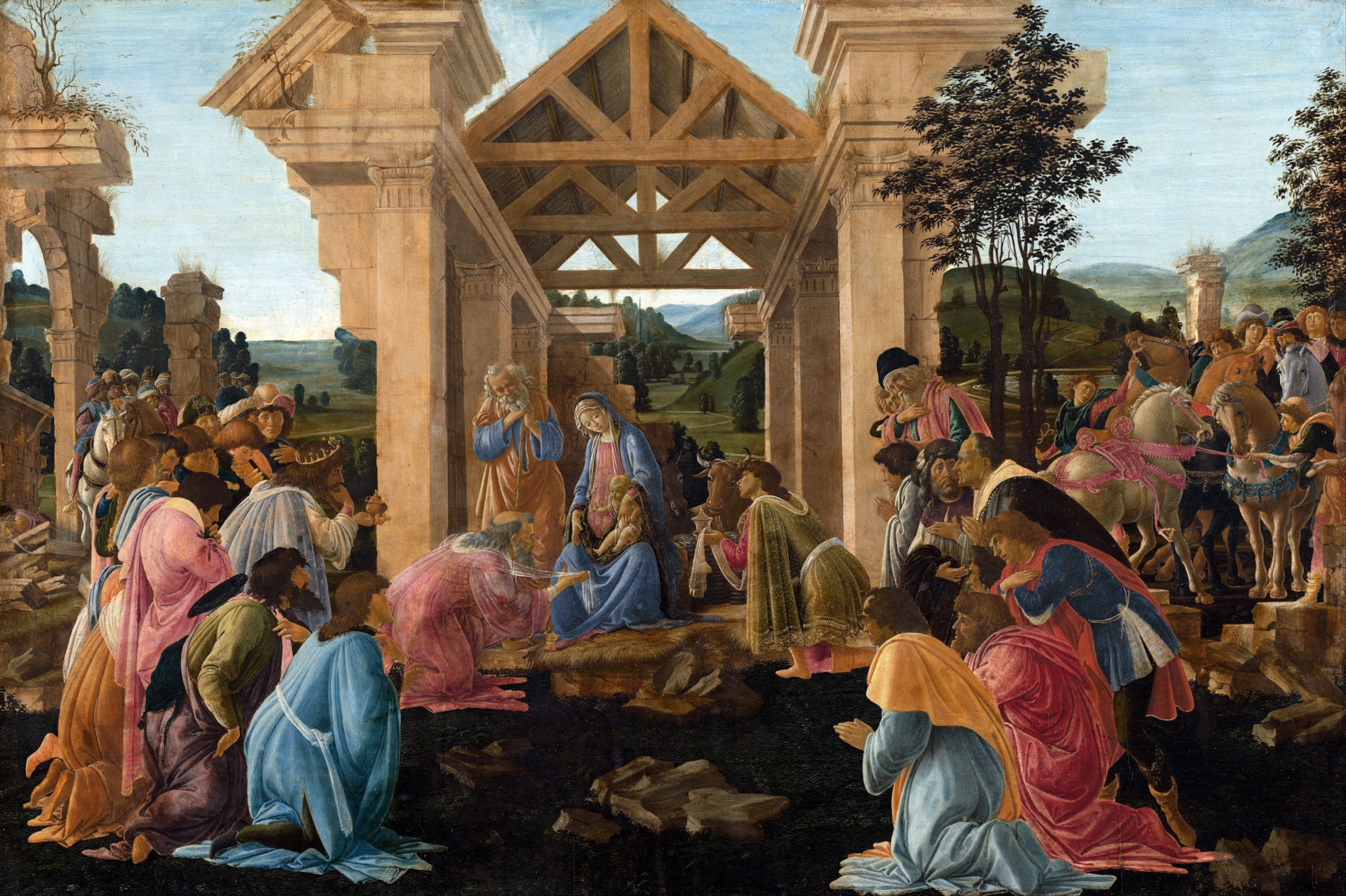 people gathered around the Nativity