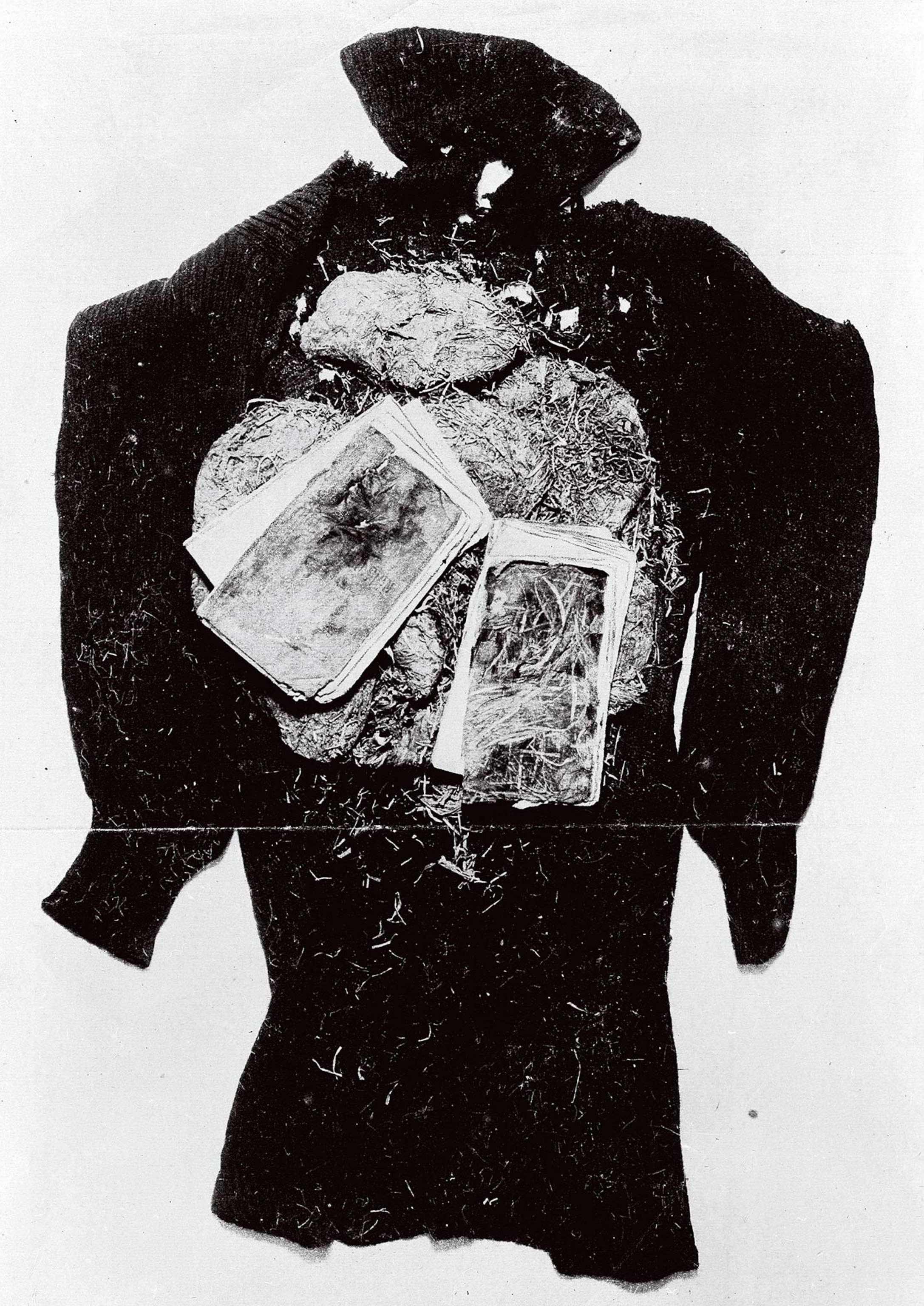 The diaries of Salomon August Andrée, found in 1930, are laid on top of a coat