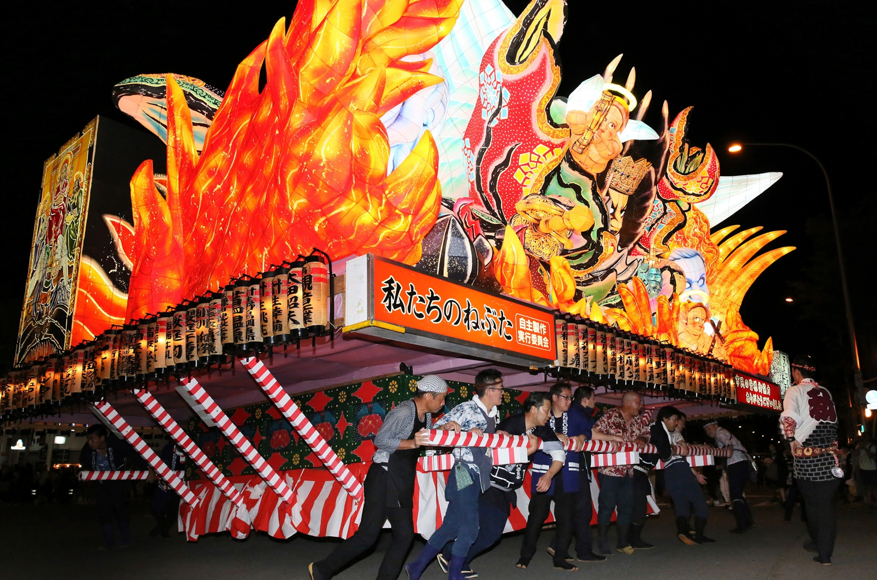 Nebuta, large lantern floats featuring samurai warriors, parade through the shopping streets in Aomori Prefecture, Japan.