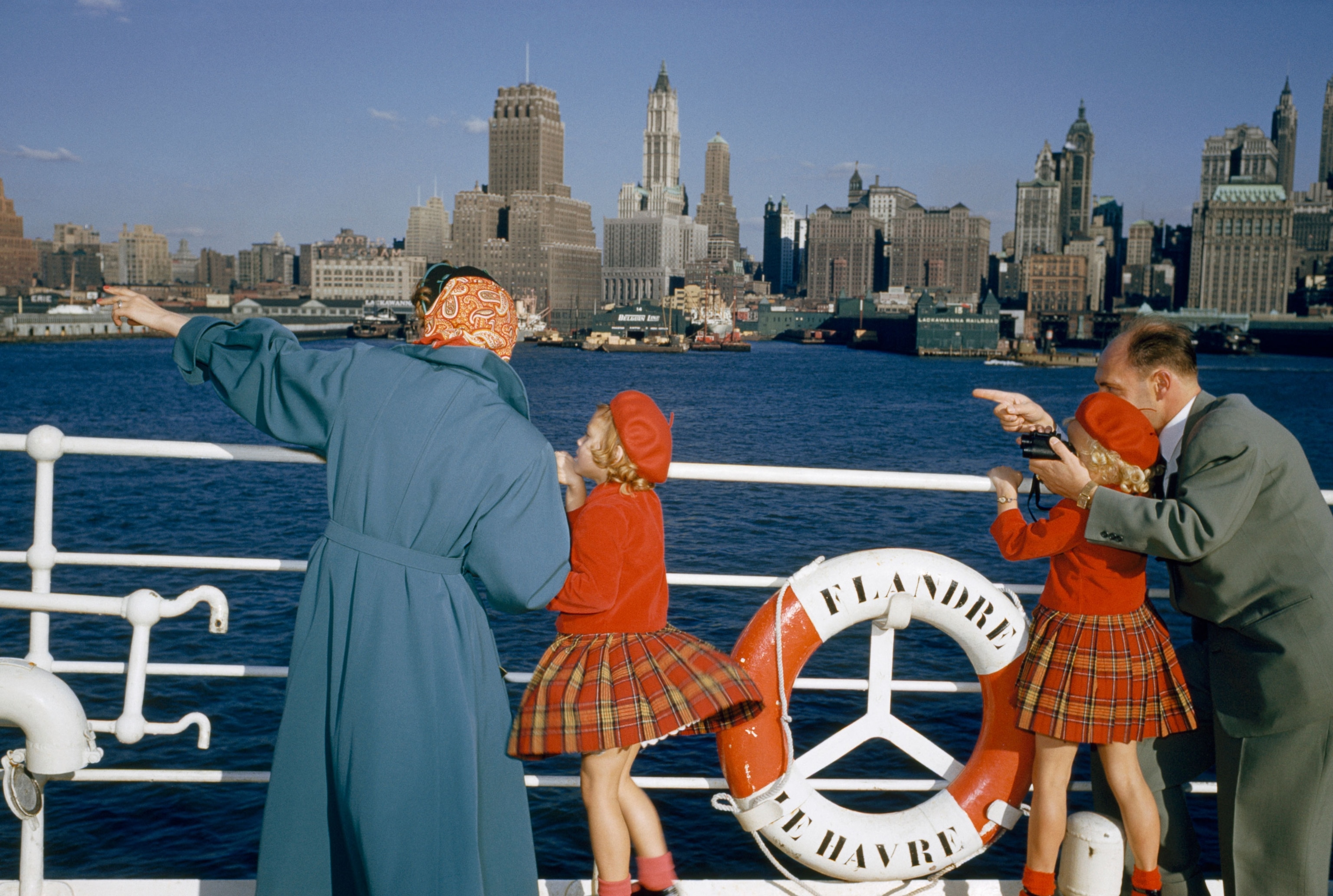a ferry pulling into the New York Harbor